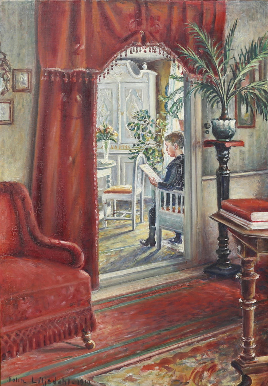 JOHN LILJEDAHL. Interior with reading boy. Oil on canvas, signed and dated 1914.