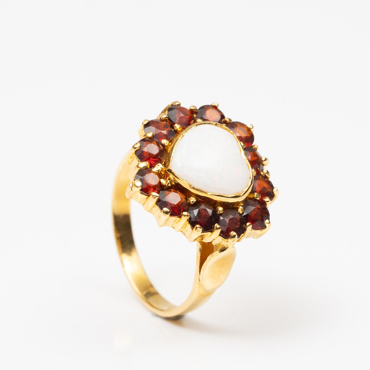 CAMOSING, gilt silver with opal and garnets.