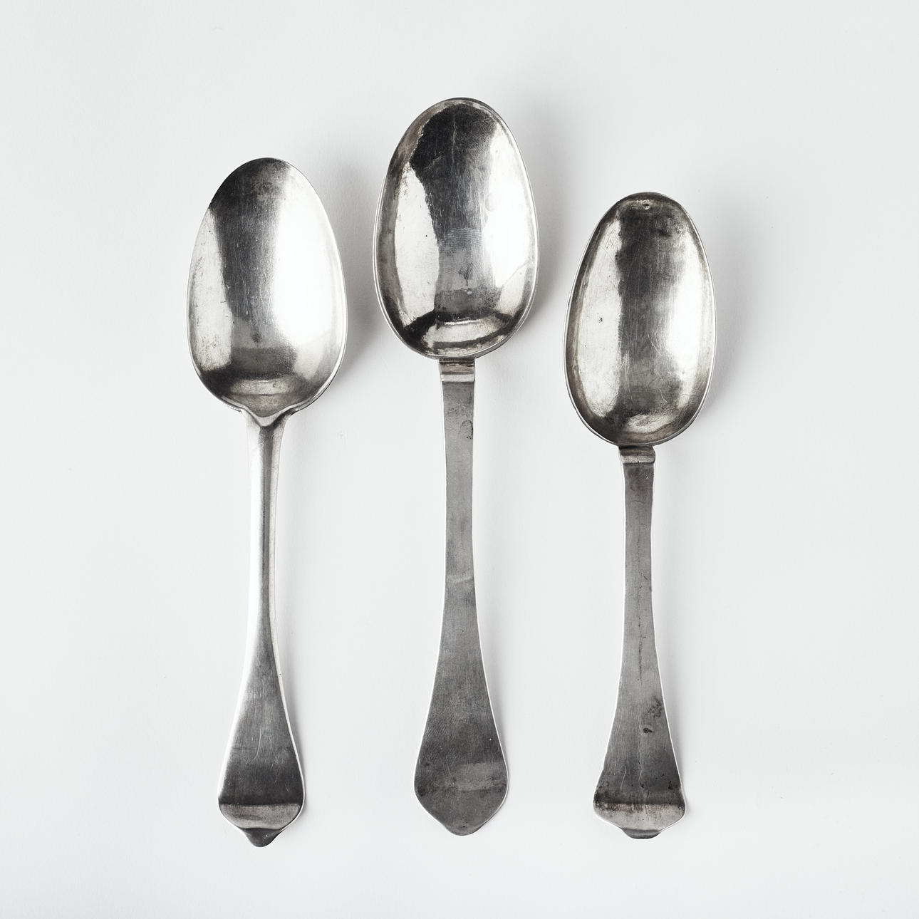 RAT TAIL SPOONS, three pieces, silver.