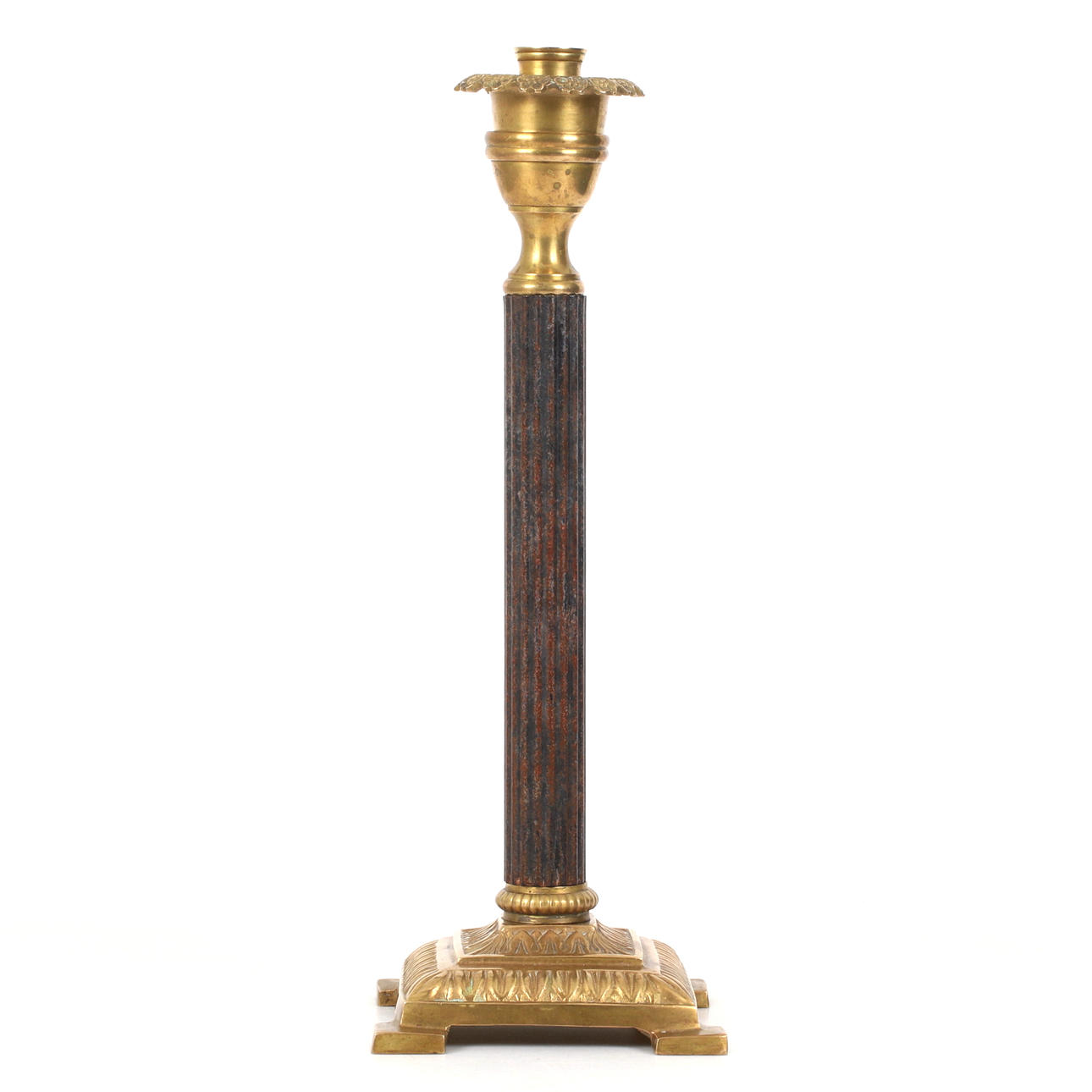 A late 20th century Empire style candlestick.