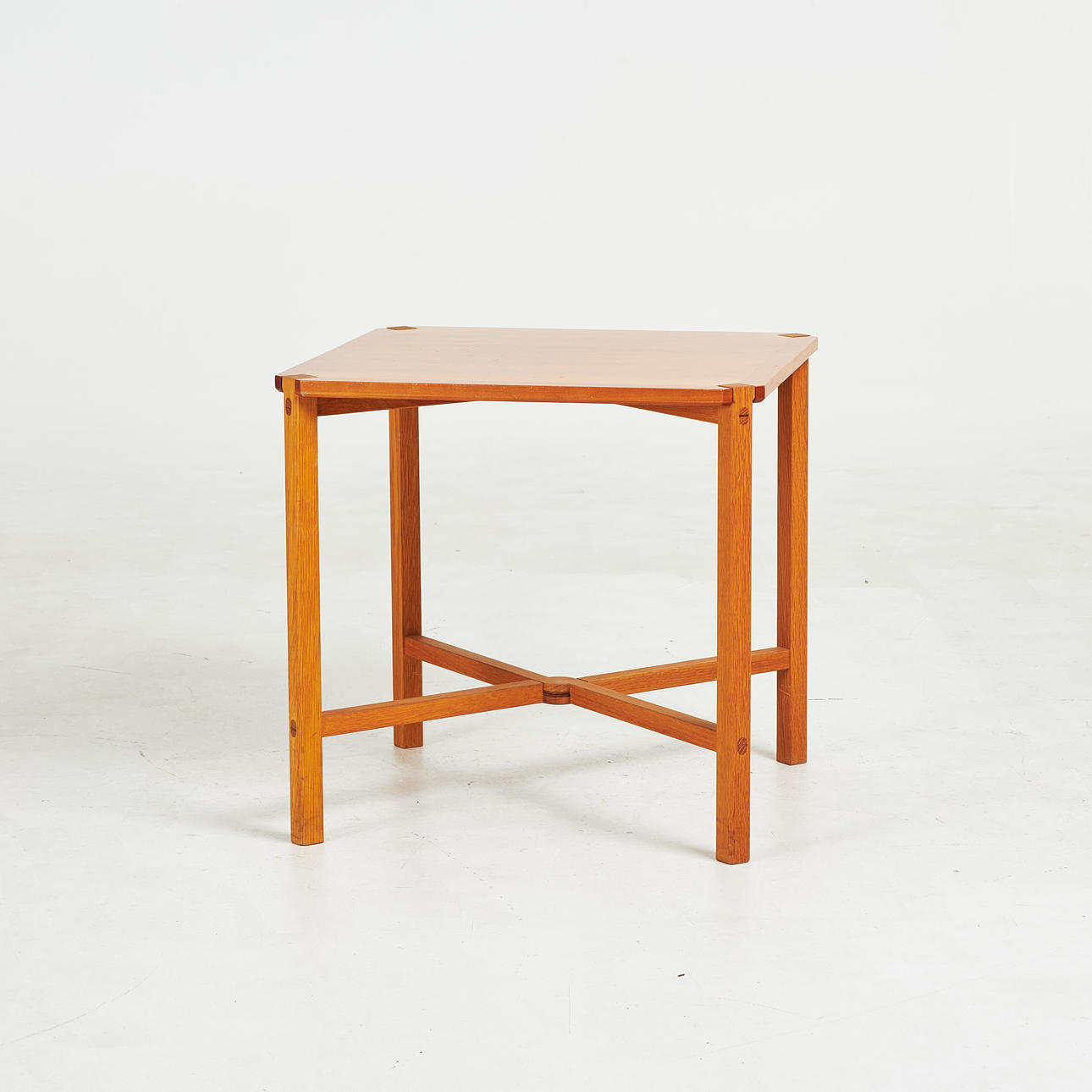 CHRISTINA FURST. coffee table, “Kaskad”, Karl Andersson & Söner, tracks from label.