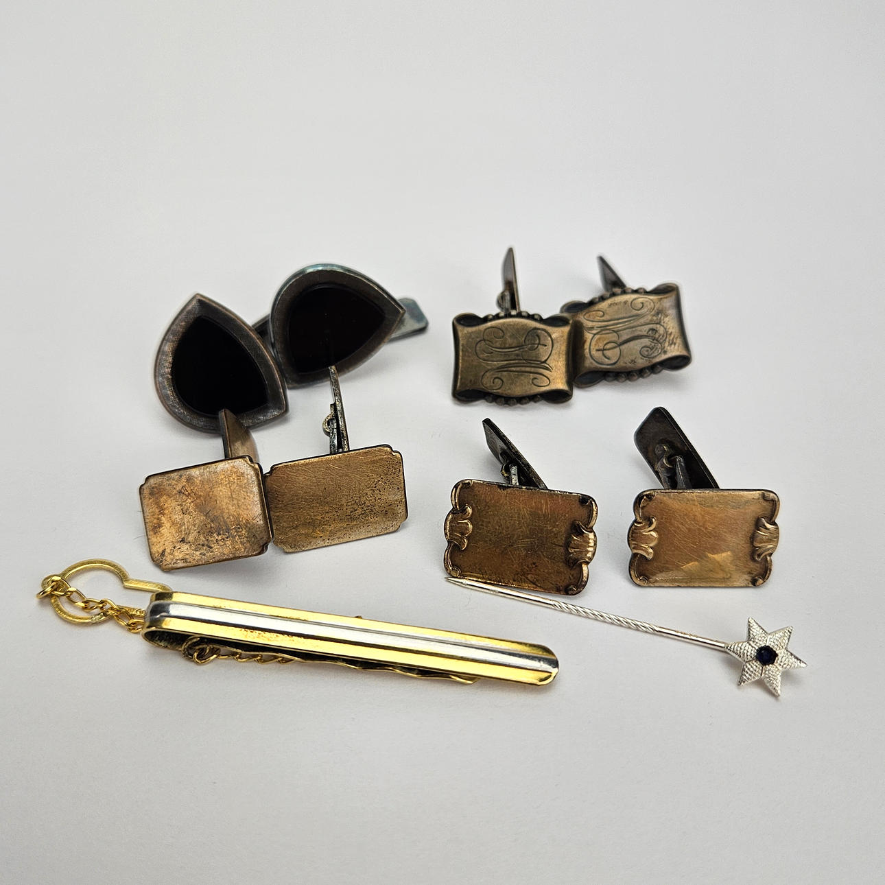 CUFFLINKS, 4 pairs, silver and TIE PIN, TIE HOLDER, silver.