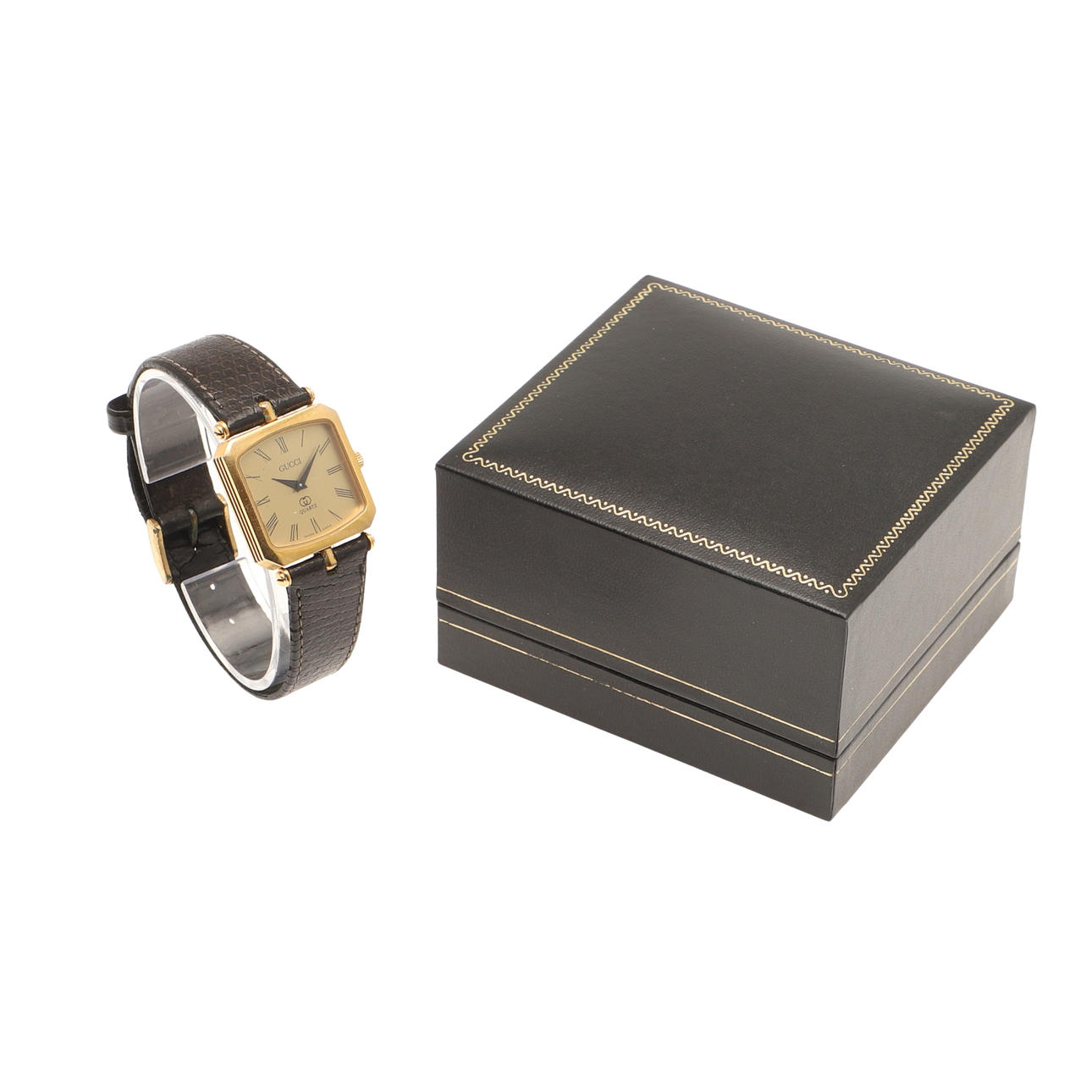 A GOLD PLATED WRISTWATCH BY GUCCI.