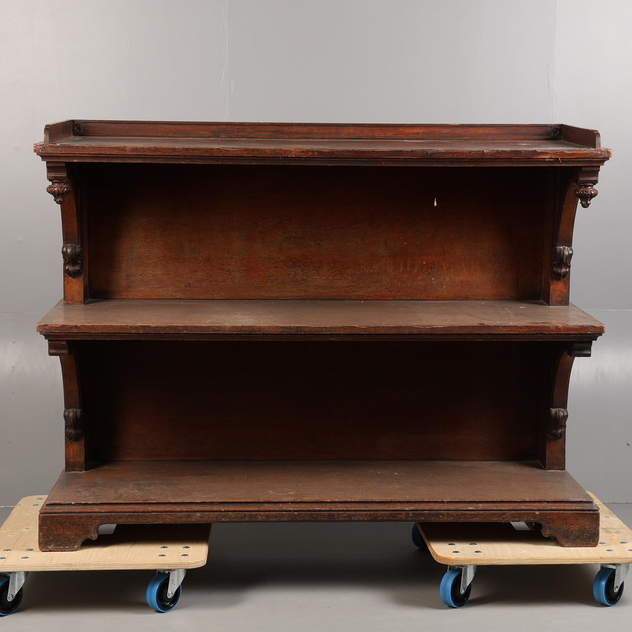 A 19TH CENTURY GOTHIC REVIVAL OAK THREE TIER BUFFET.