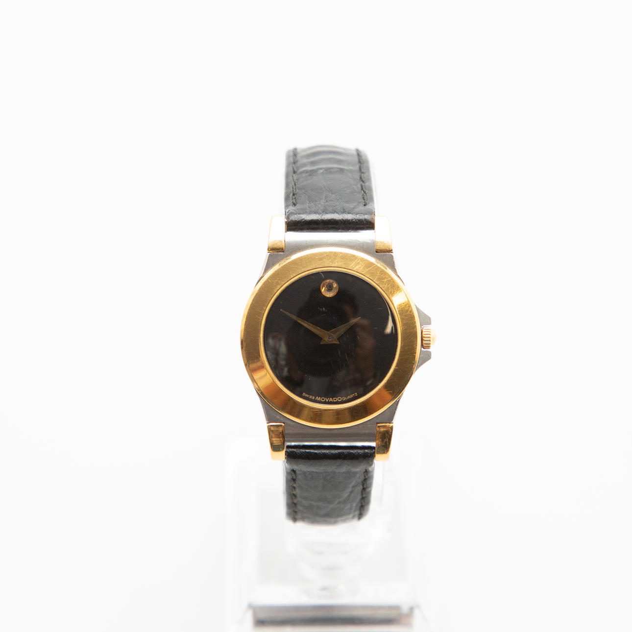 Movado wristwatch.