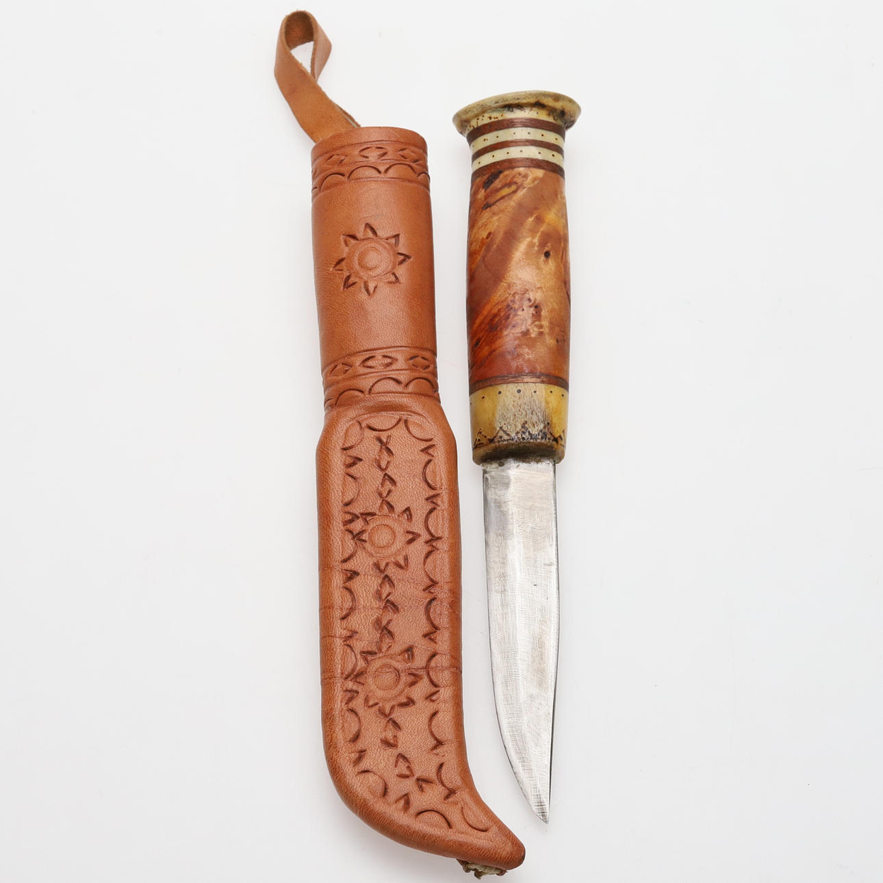 SAMI KNIFE. reindeer horns, wood, leather.