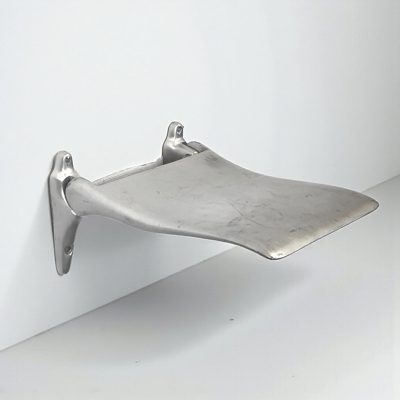 WALL-HUNG FOLDING CHAIR. Edblad, aluminium, contemporary.