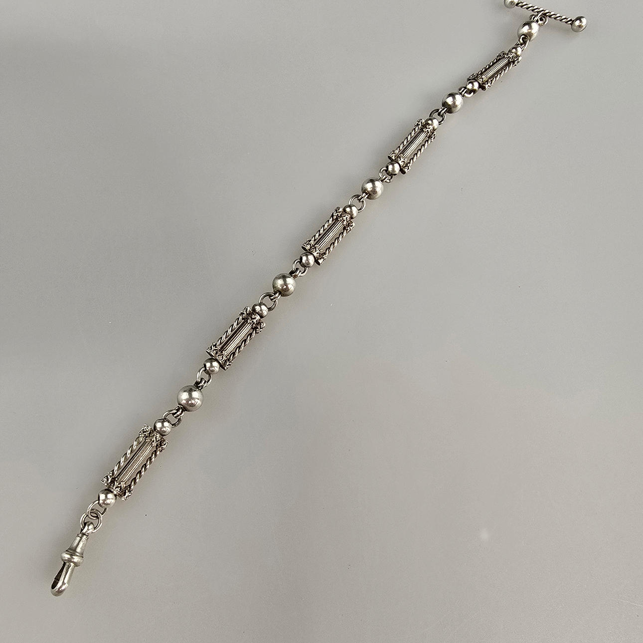 - POCKET WATCH GAG CHAIN - SILVER TESTED.