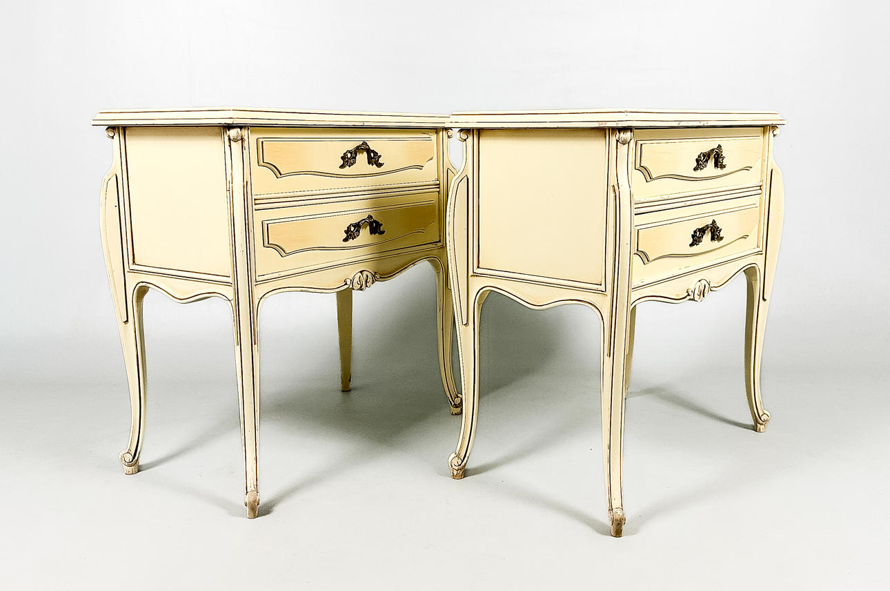 A pair of 20th century bedside tables.