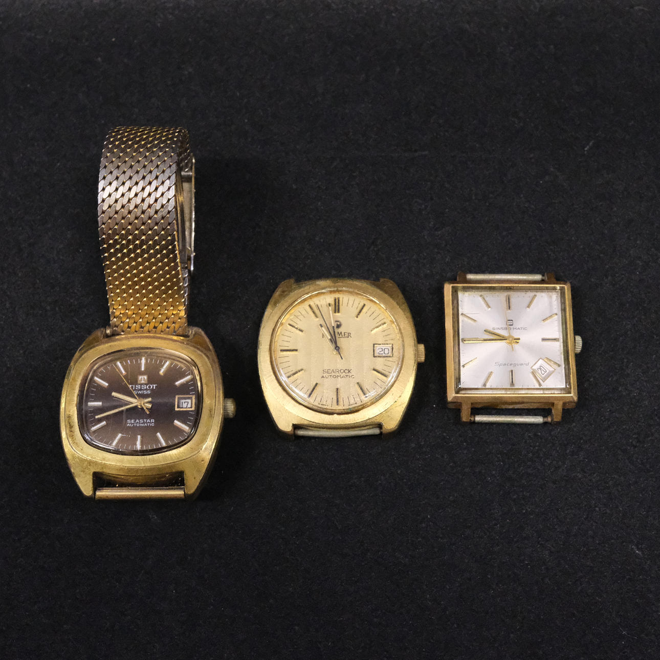WRISTWATCH, THREE PIECES.