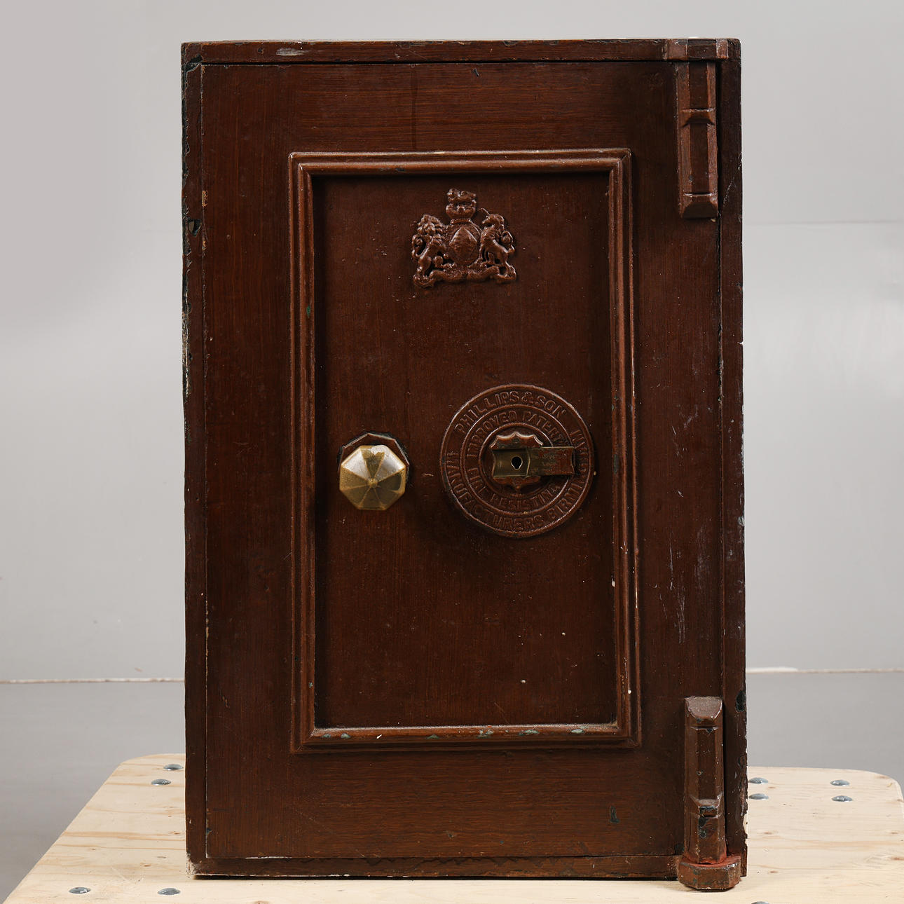 A 19TH CENTURY CAST IRON SAFE BY PHILLIPS & SON.