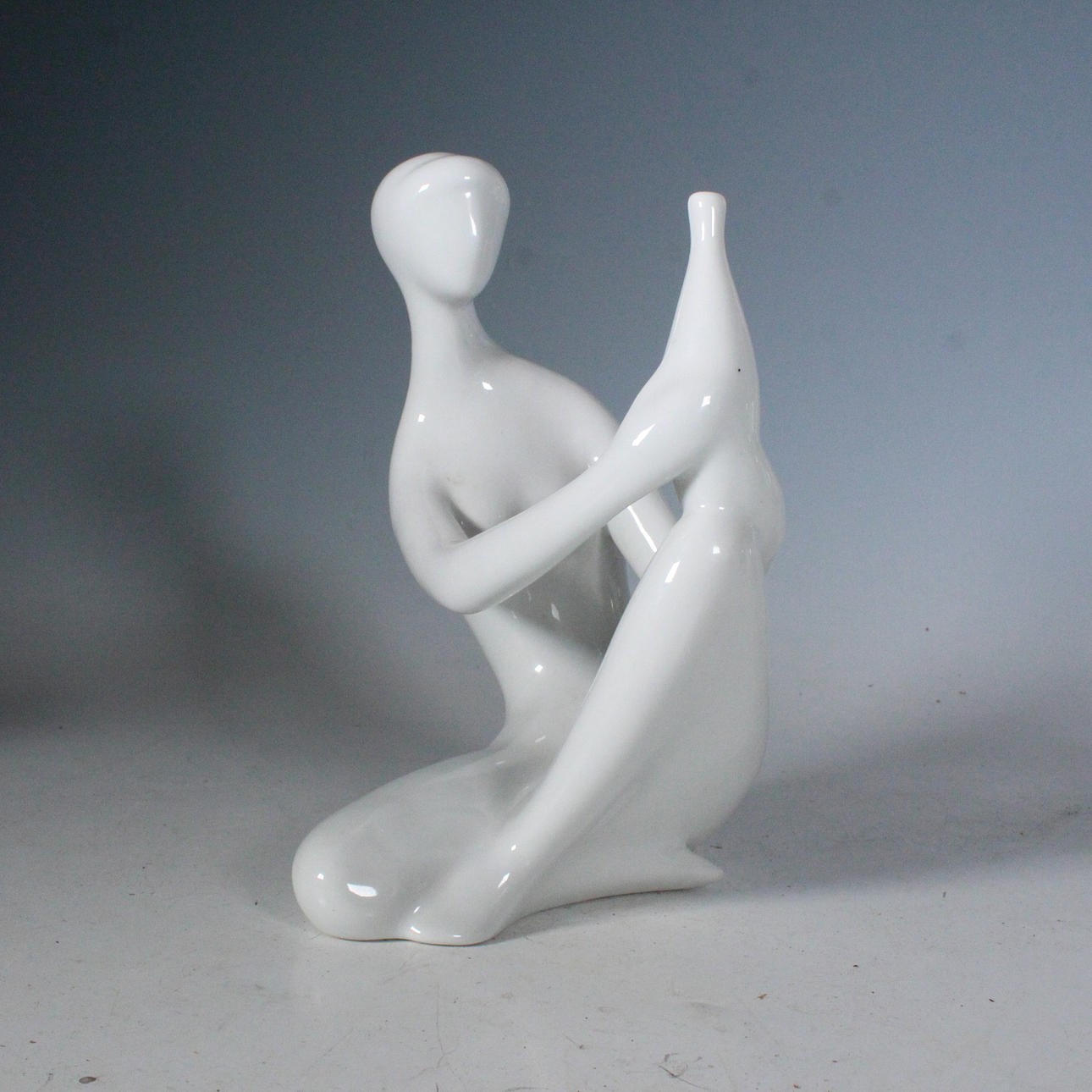 Royal DUX Jitka Forejtova, porcelain figurine, “Seated woman with