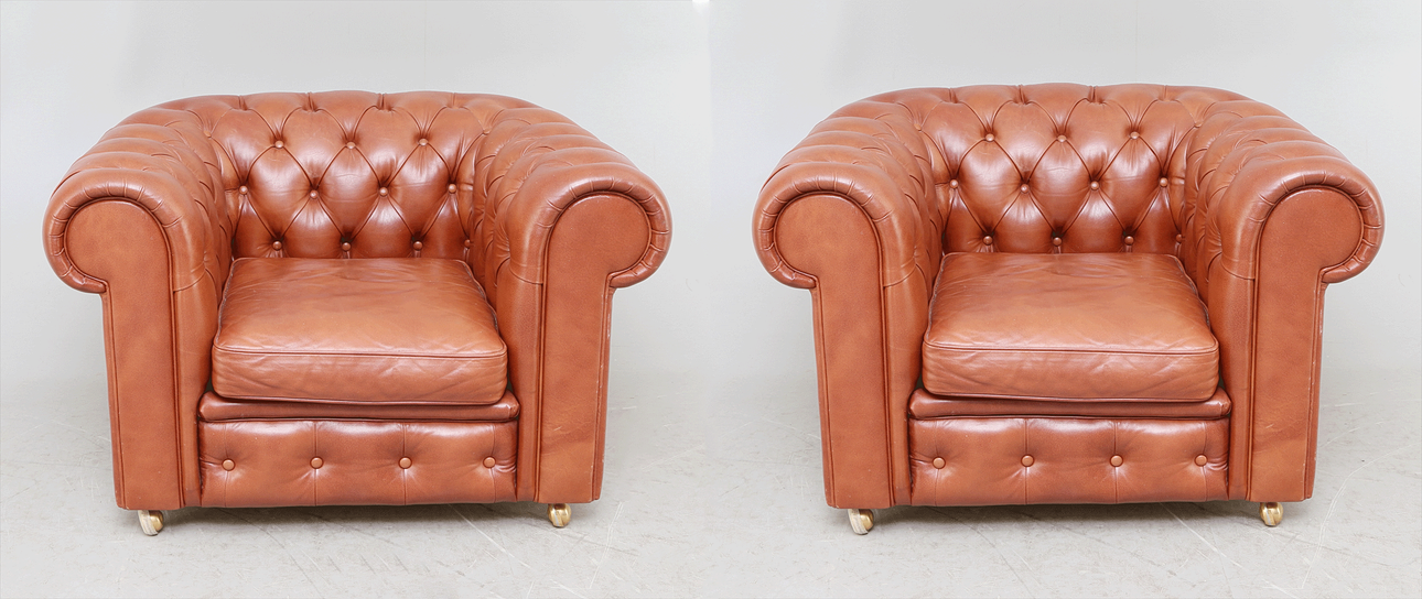 CLUBFÅTÖLJER, 1 par, skinn, 1900-talets andra del.