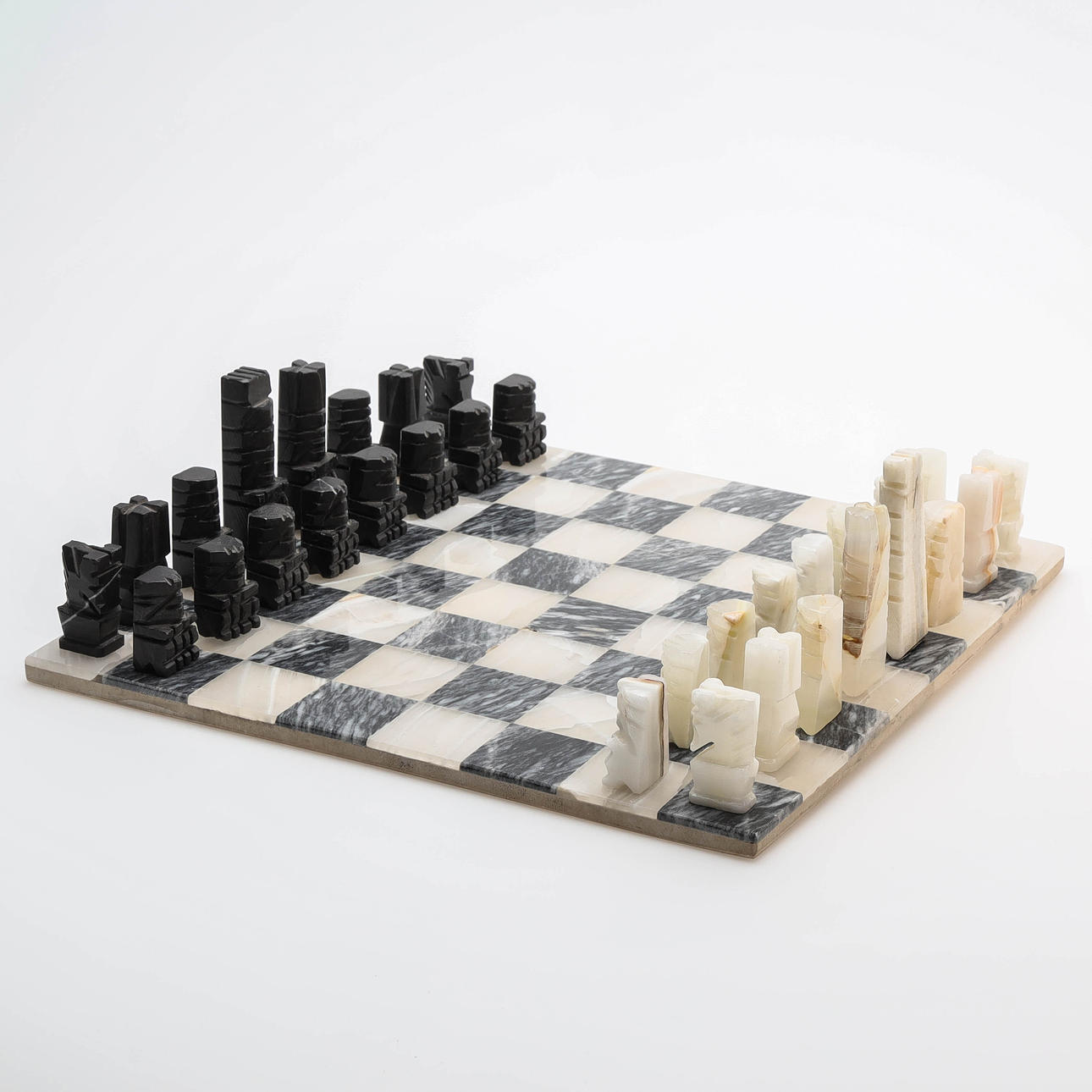 A 33 piece onyx & marble chess set, 20th century.