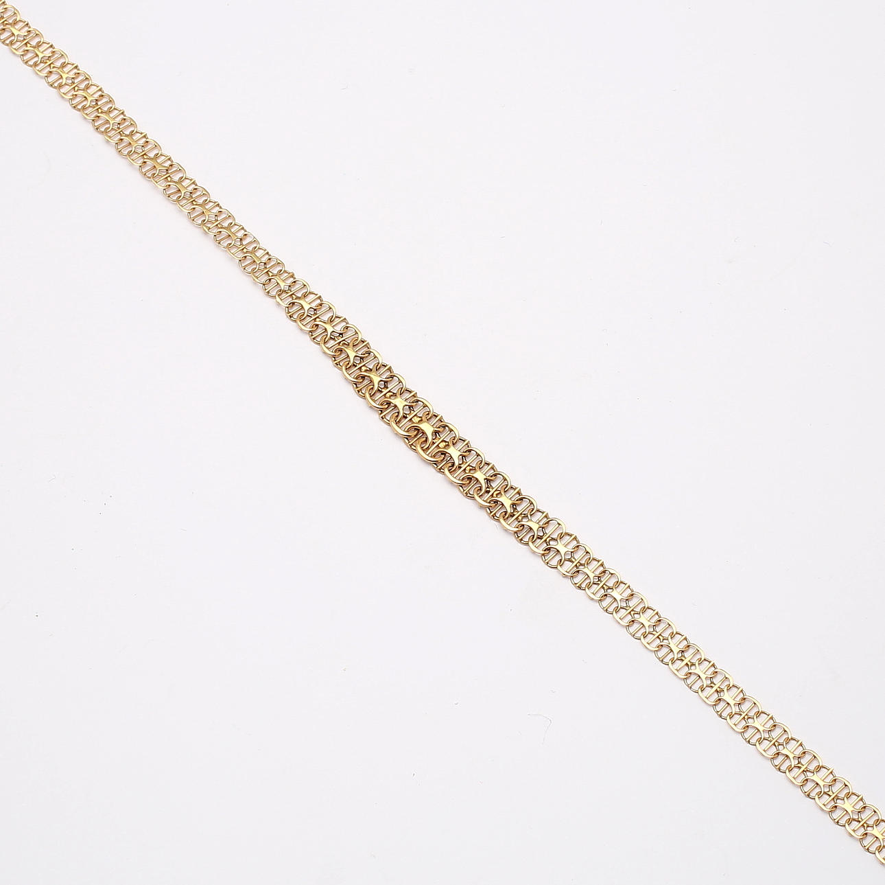 X-LÄNK med stav, 18K guld. Totalvikt ca 12 g.