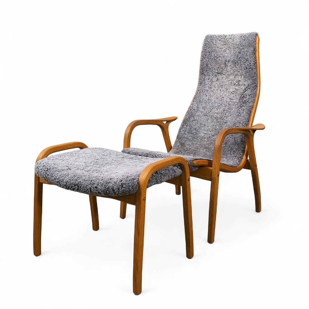 YNGVE EXTRACT. “Lamino”, armchair with footstool, Swedese, grey sheep ...