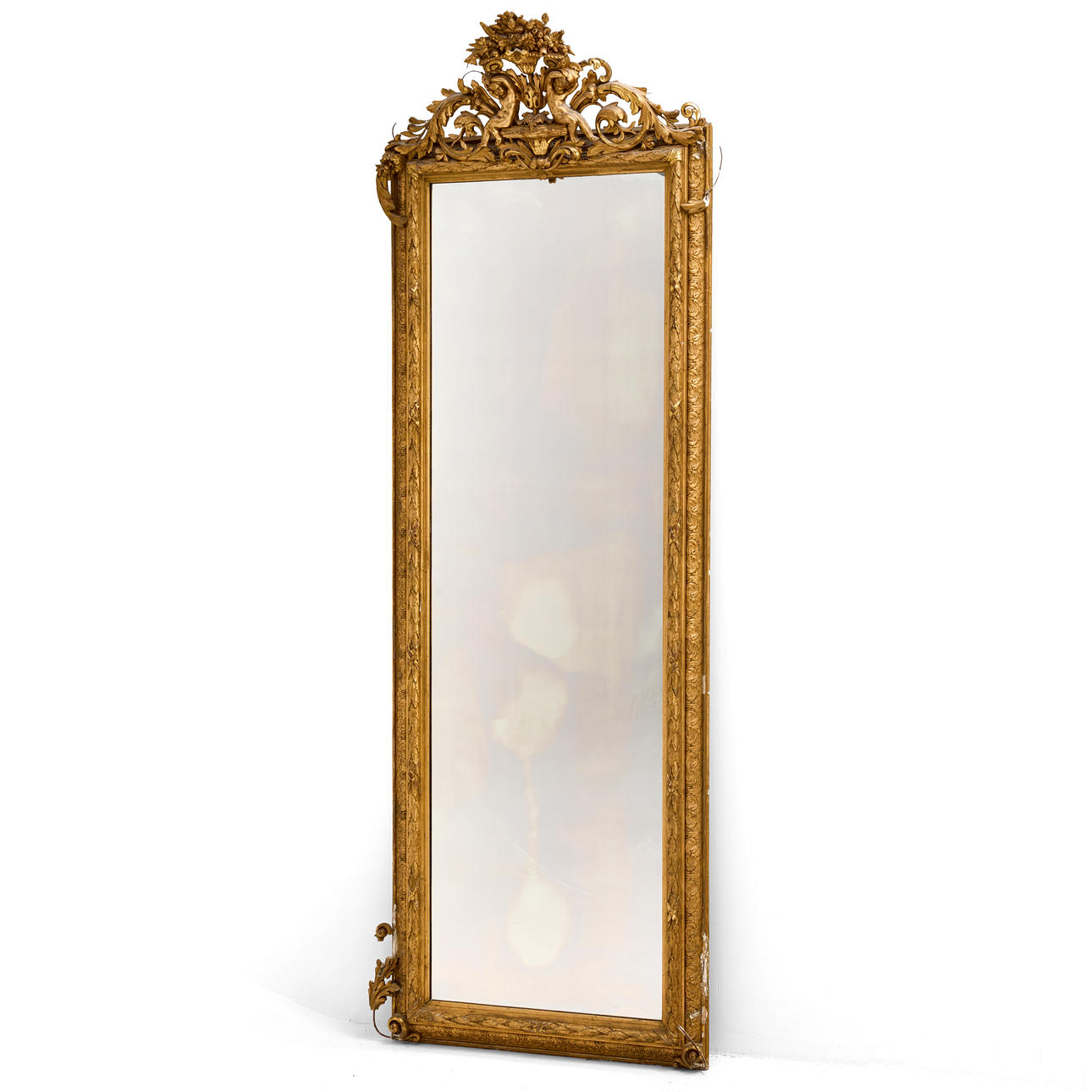 A 19th century neo-rococo mirror. Gilded frame with openwork decor, height approx. 260 cm.