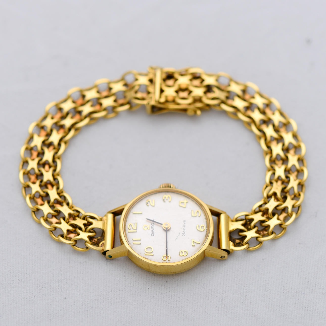 OMEGA, naisten rannekello, 18K kultaa.