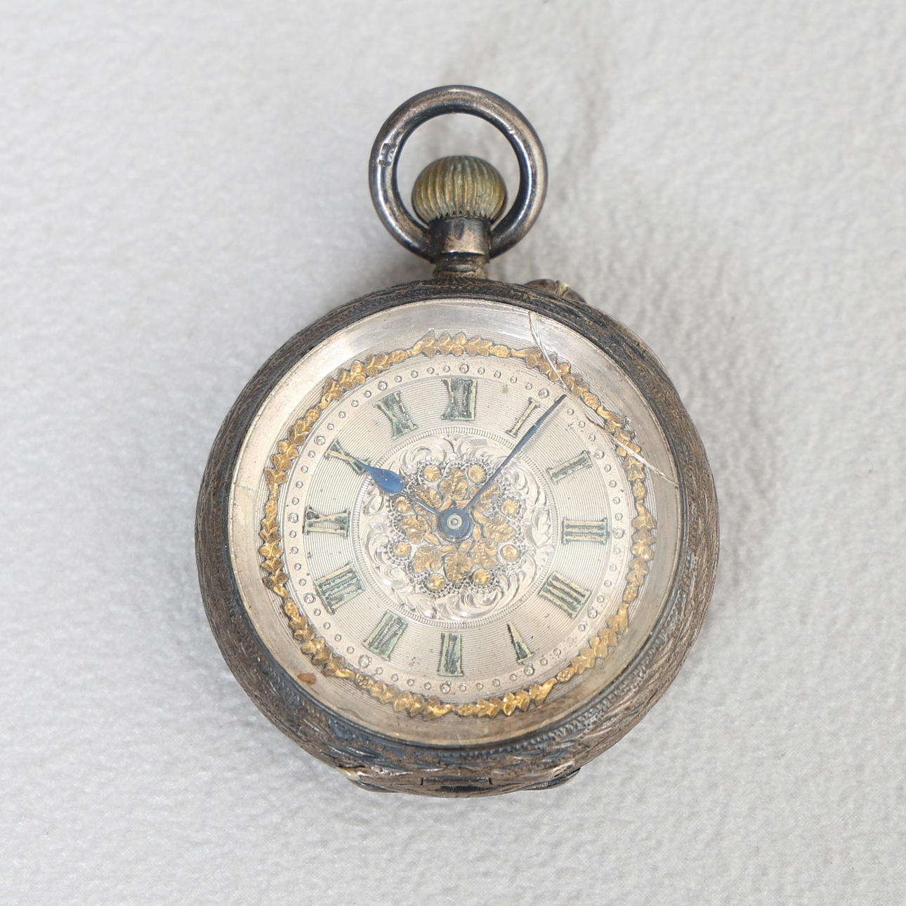 A CONTINENTAL SILVER FOB WATCH.