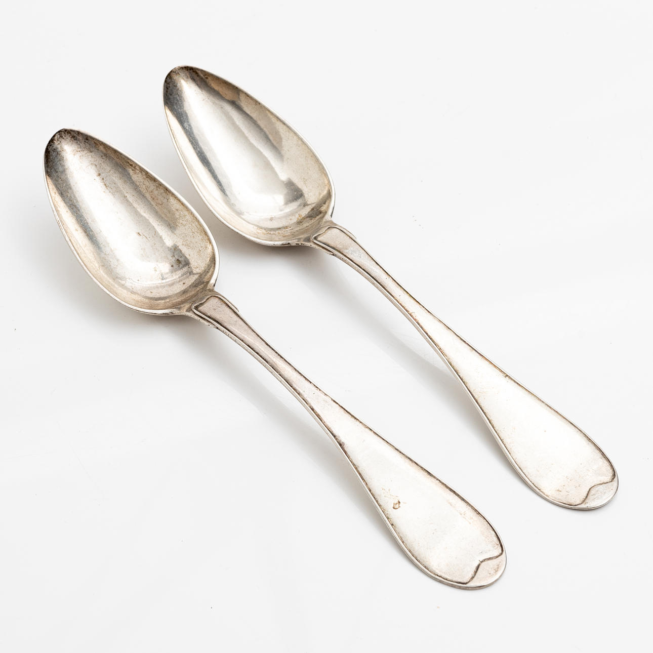 A pair of silver Gustaf Folcker spoons, Stockholm, 1816. Silver ...