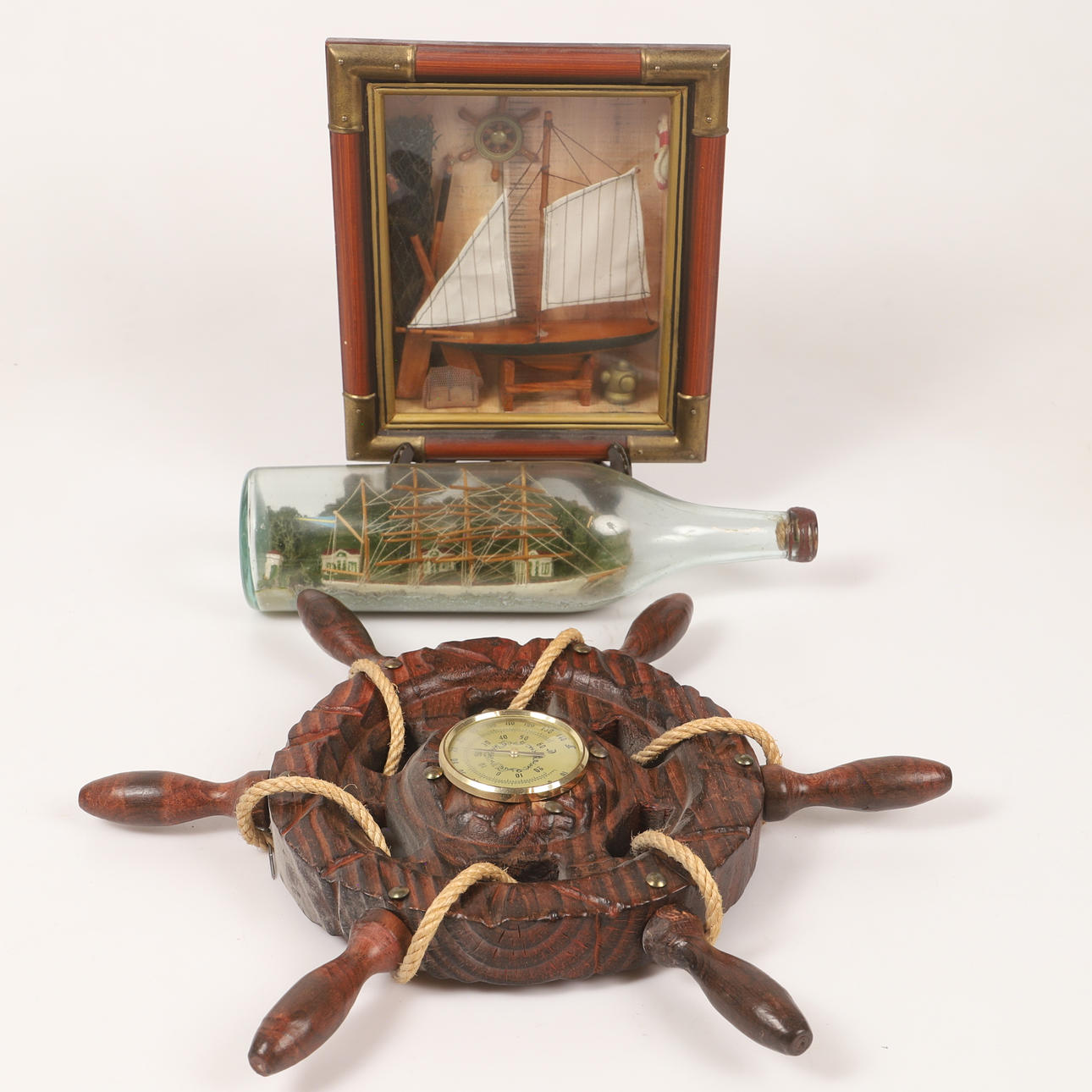 STEERING WHEEL, BOTTLE SHIP AND BOARD.