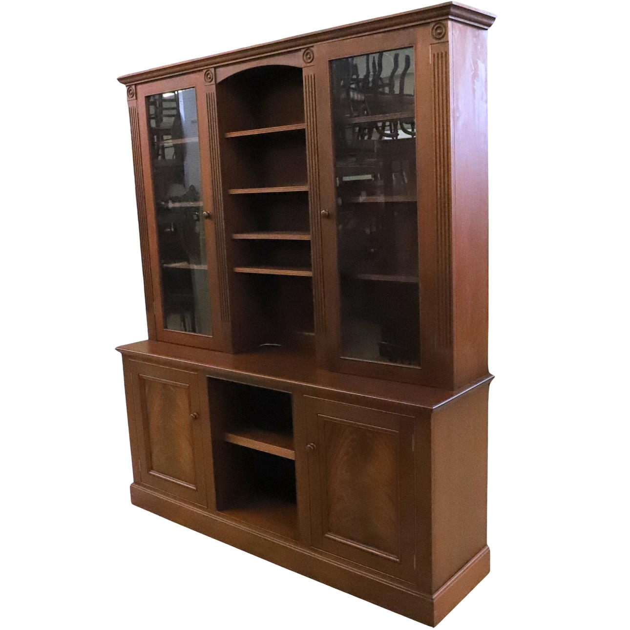 A REPRODUCTION BOOKCASE.