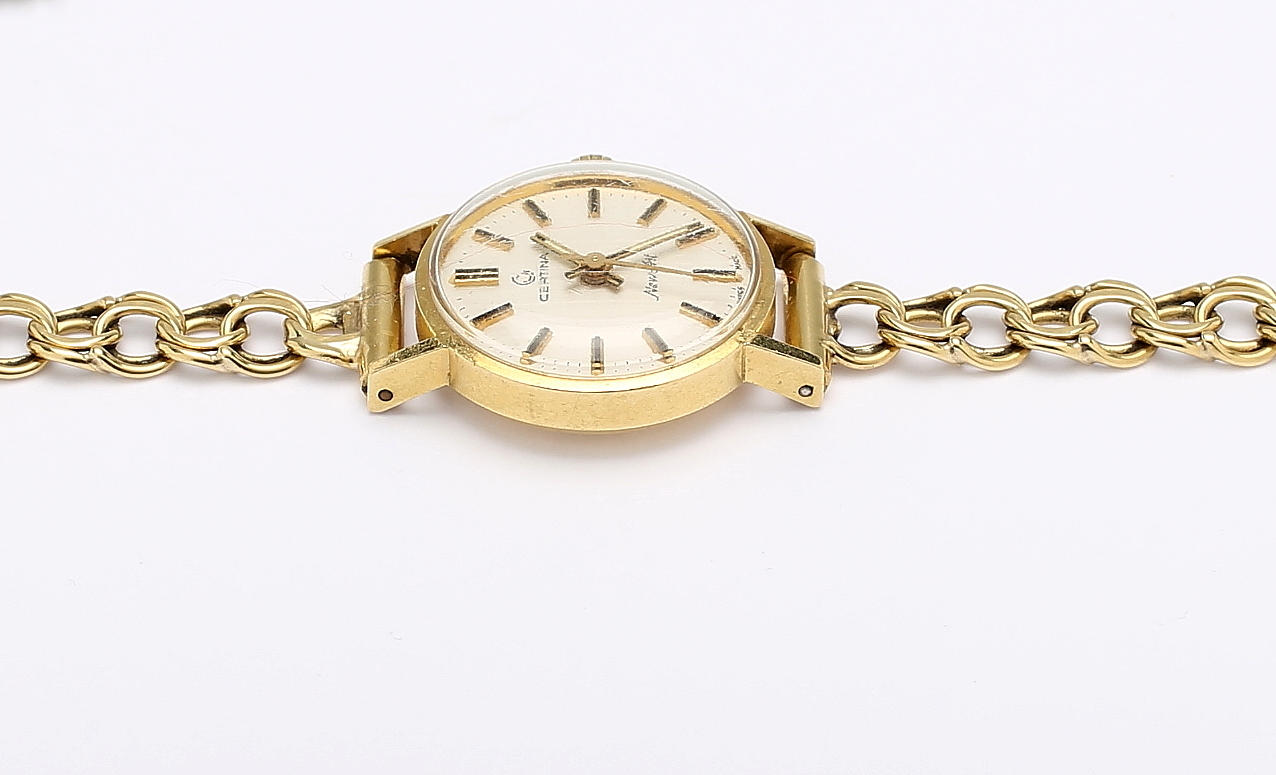 DAMARMBANDSUR, 18K guld, Certina New Art, 1900-talets andra hälft. Totalvikt ca 27,5 g.