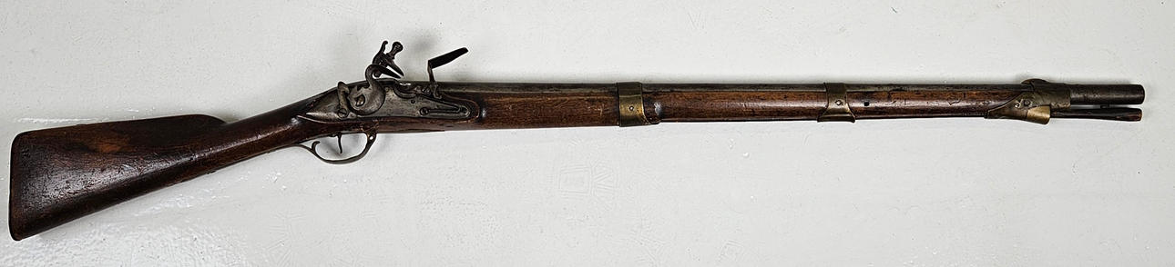 A 19th century flintlock rifle.