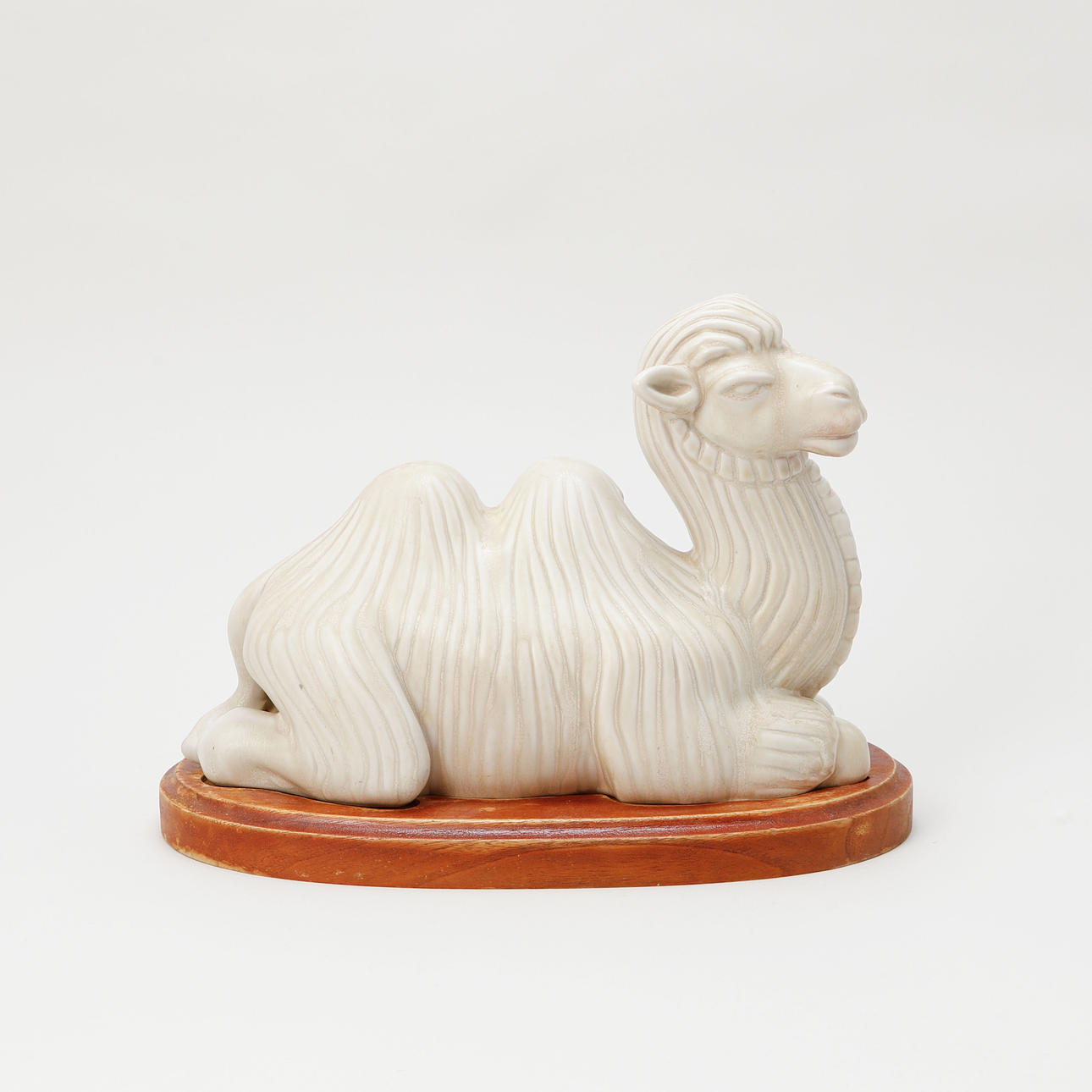 GUNNAR NYLUND. A stoneware camel, Rörstrand. Ceramics & Porcelain