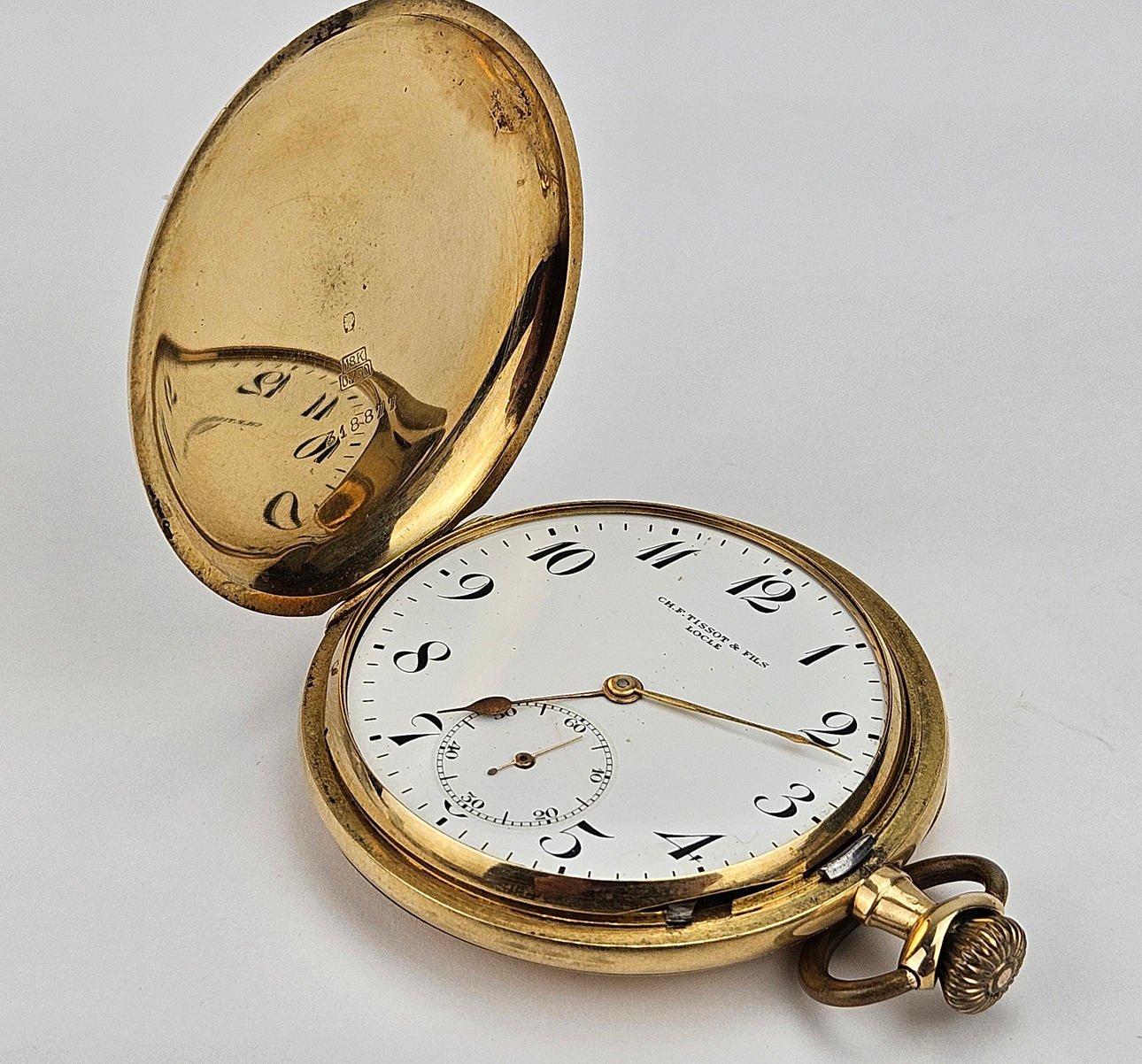 A pocket watch, gold, 18K, in case, CH. F. Tissot & Fils, Locle