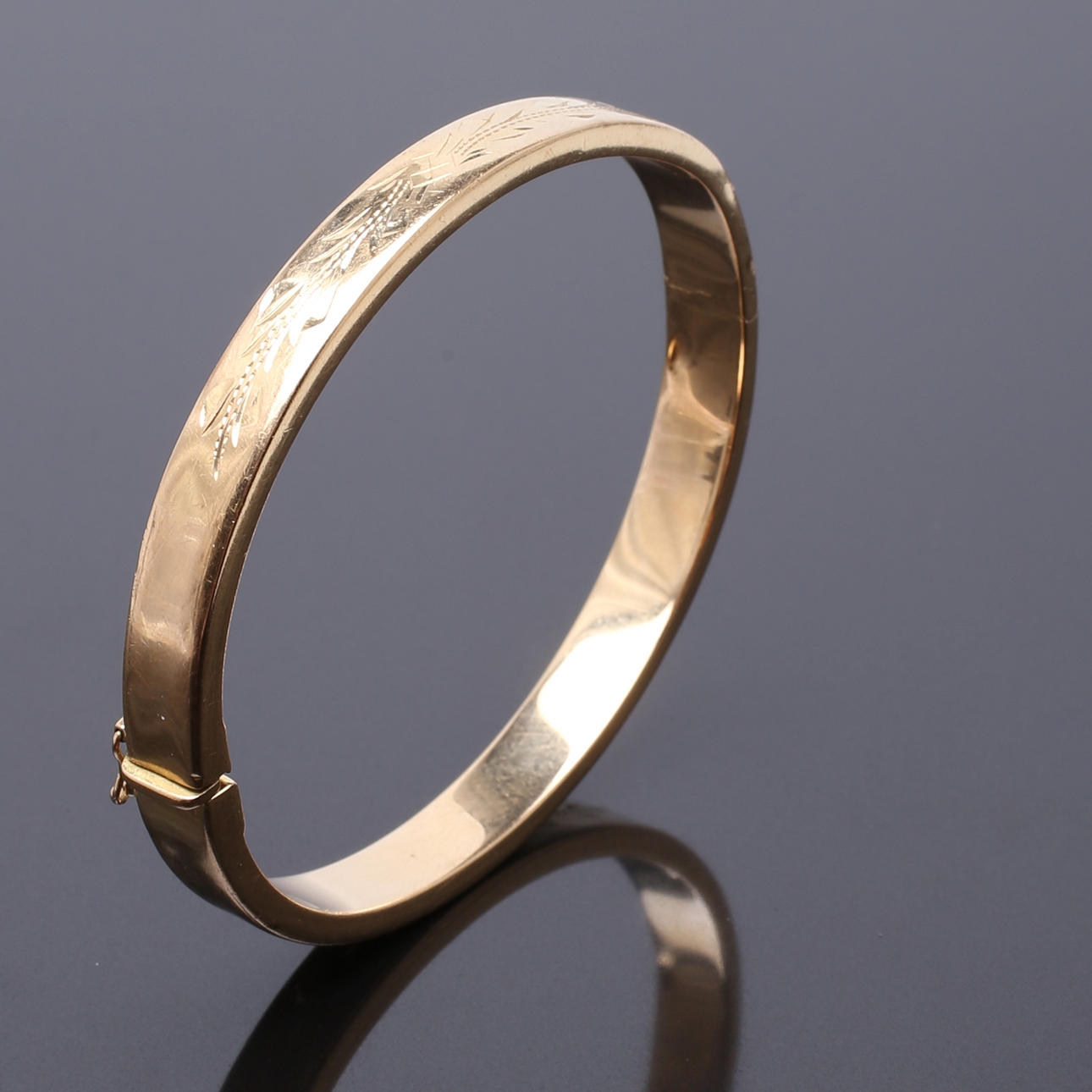 ARMBAND i 18 K gult guld, vikt 17,58 g.