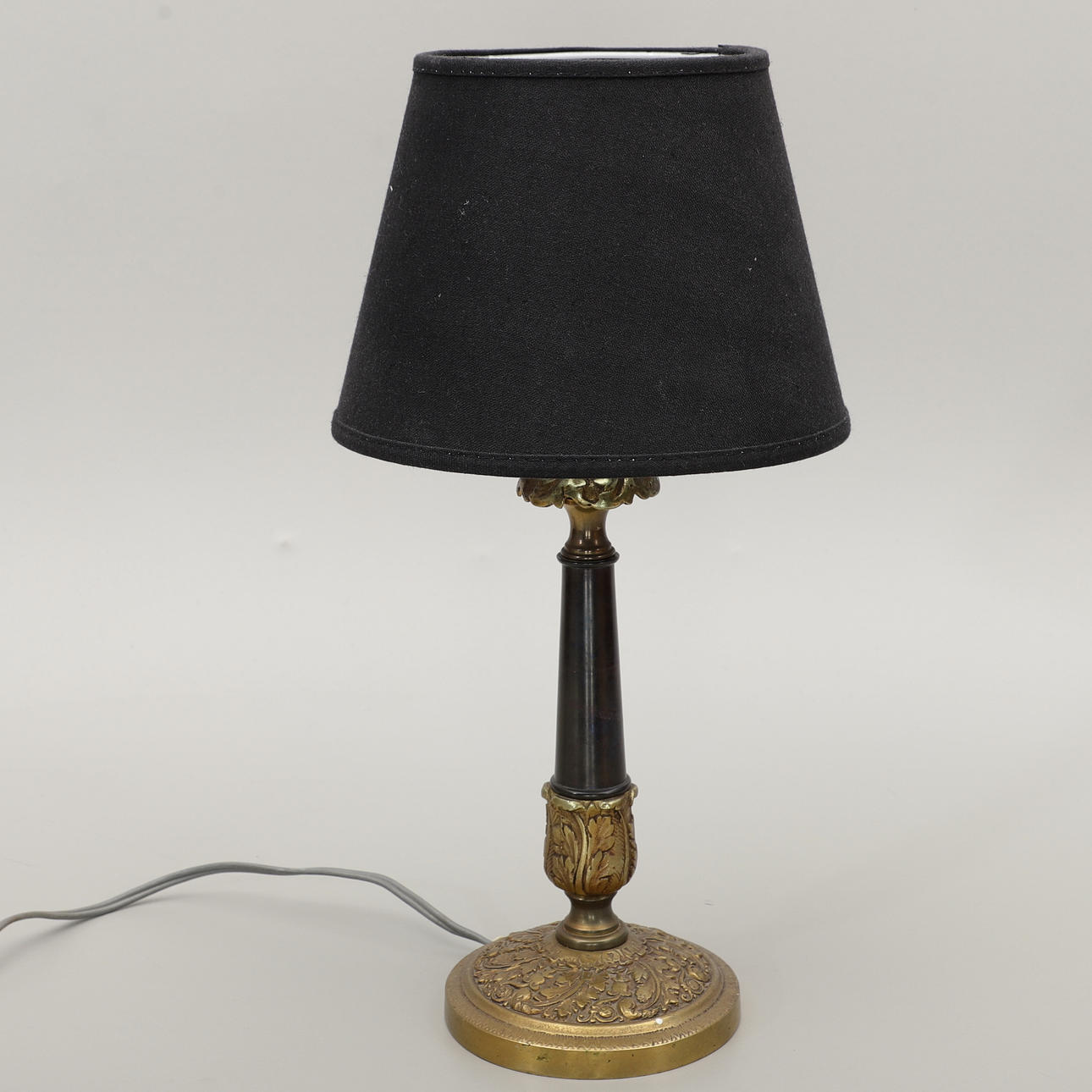 A brass table lamp, mid 20th century.