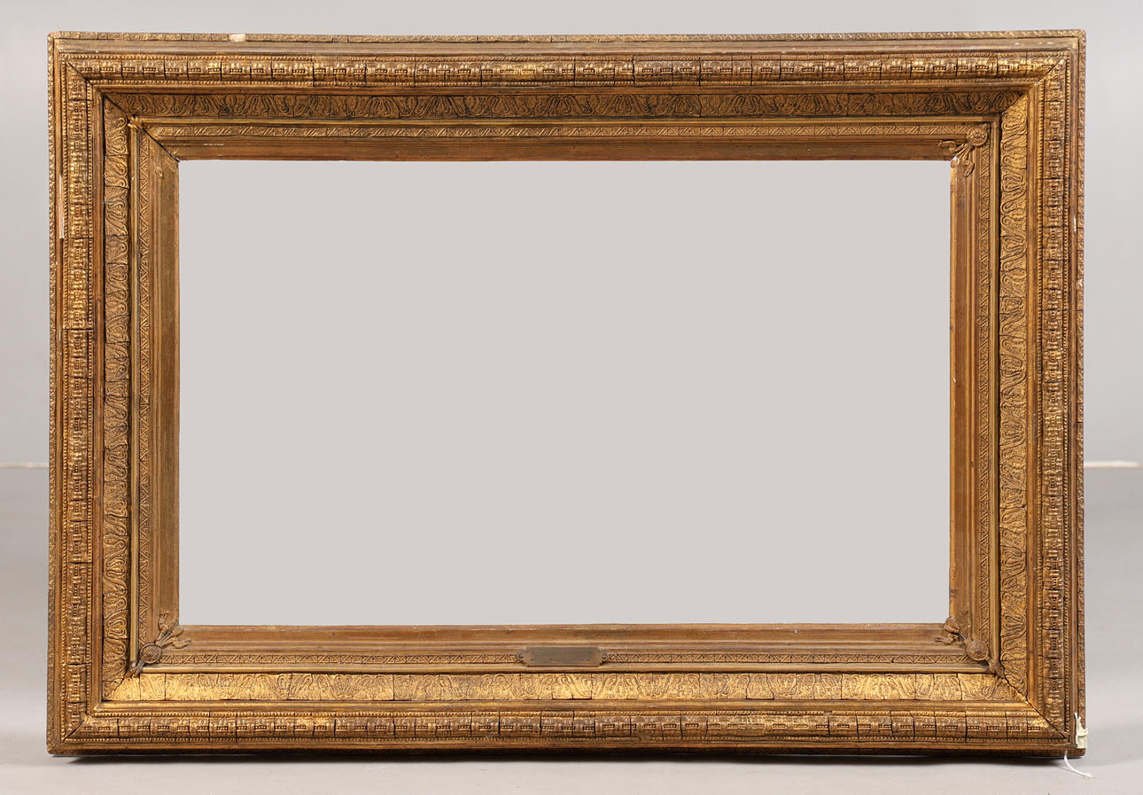 A 19TH CENTURY CONTINENTAL RUNNING PATTERN PICTURE FRAME.