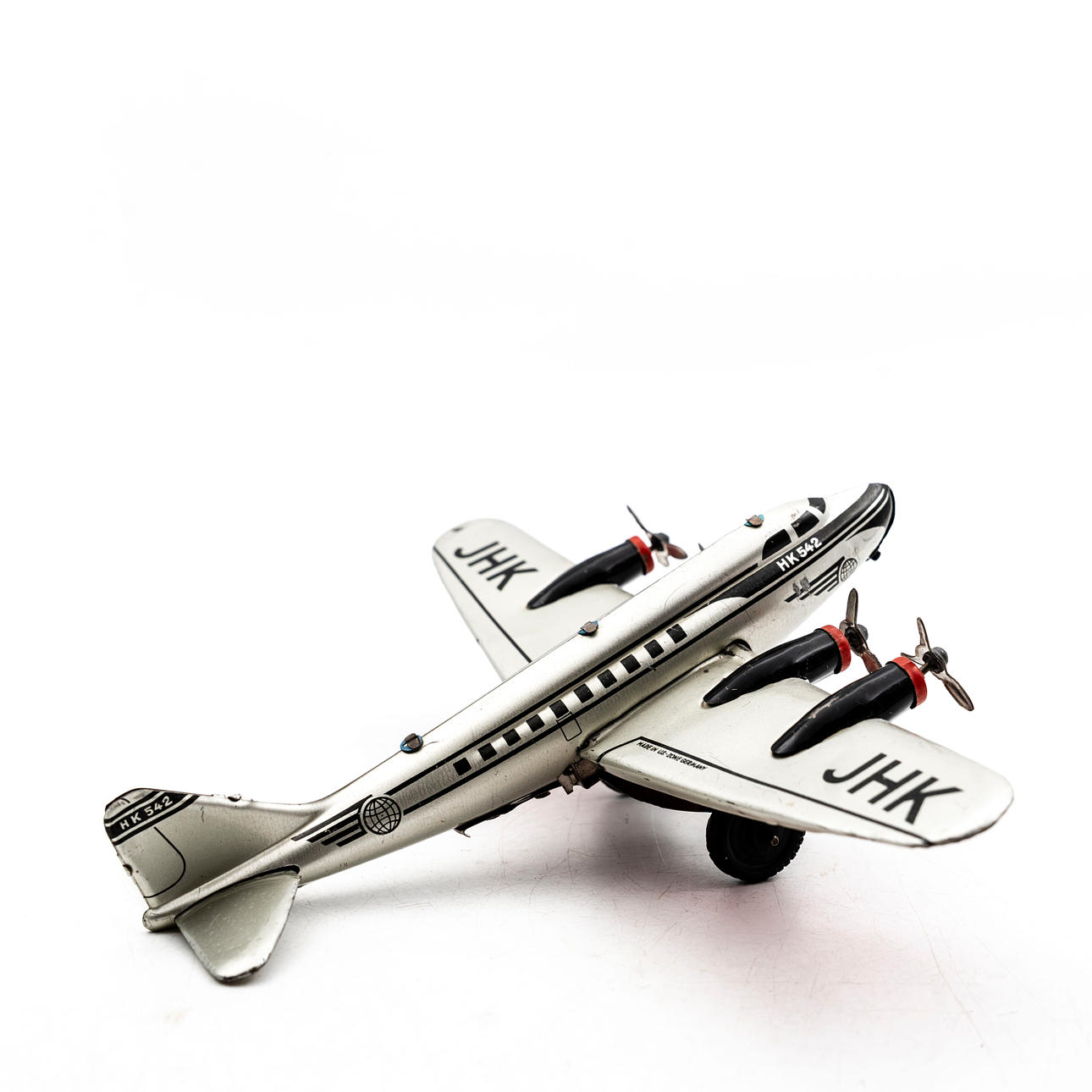A metal toy, aeroplane, “JHK 542