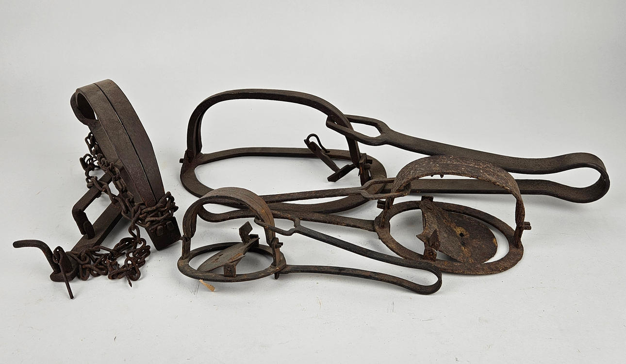 A set of four metal trappers, 1800/20th century. Weapons & Militaria ...