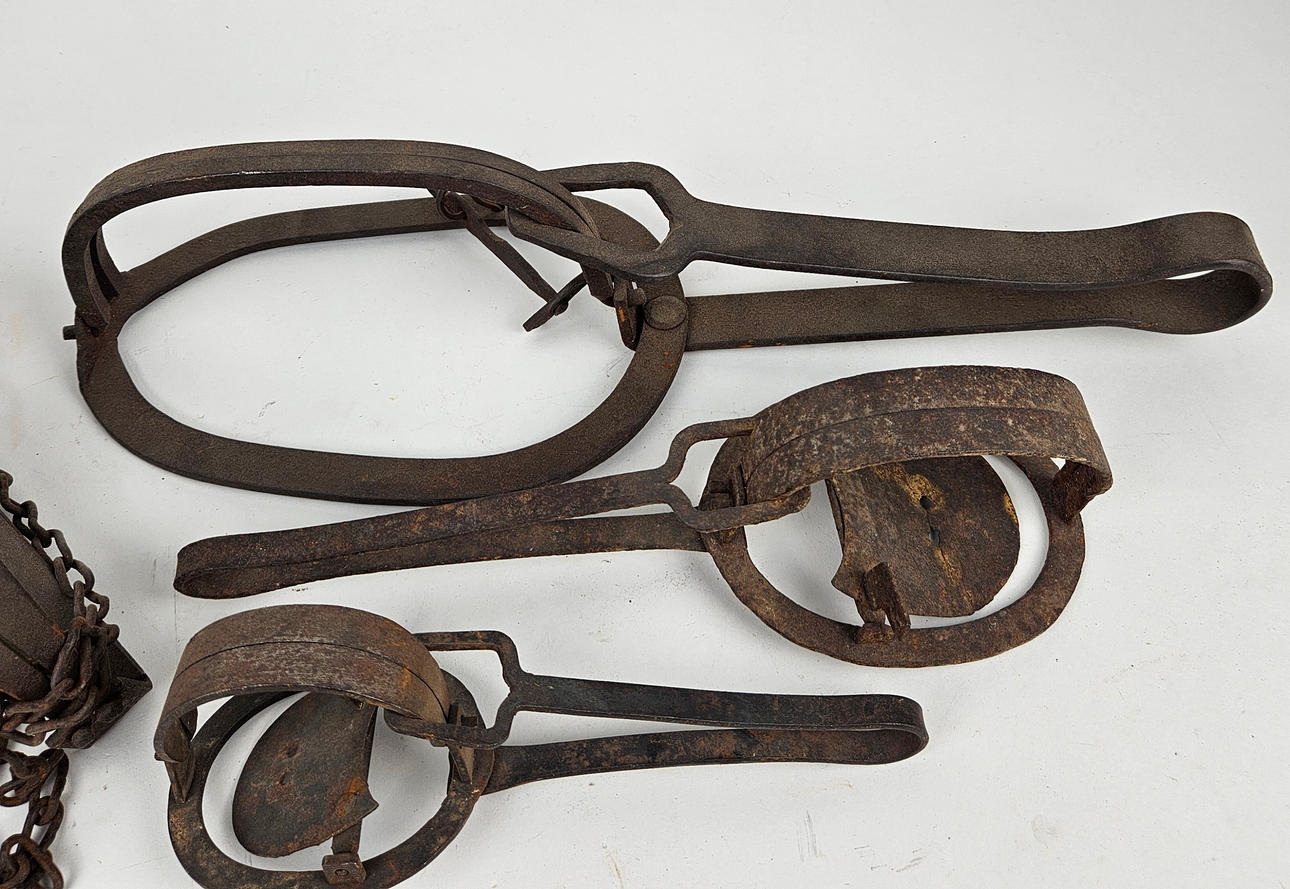 A set of four metal trappers, 1800/20th century. Weapons & Militaria ...