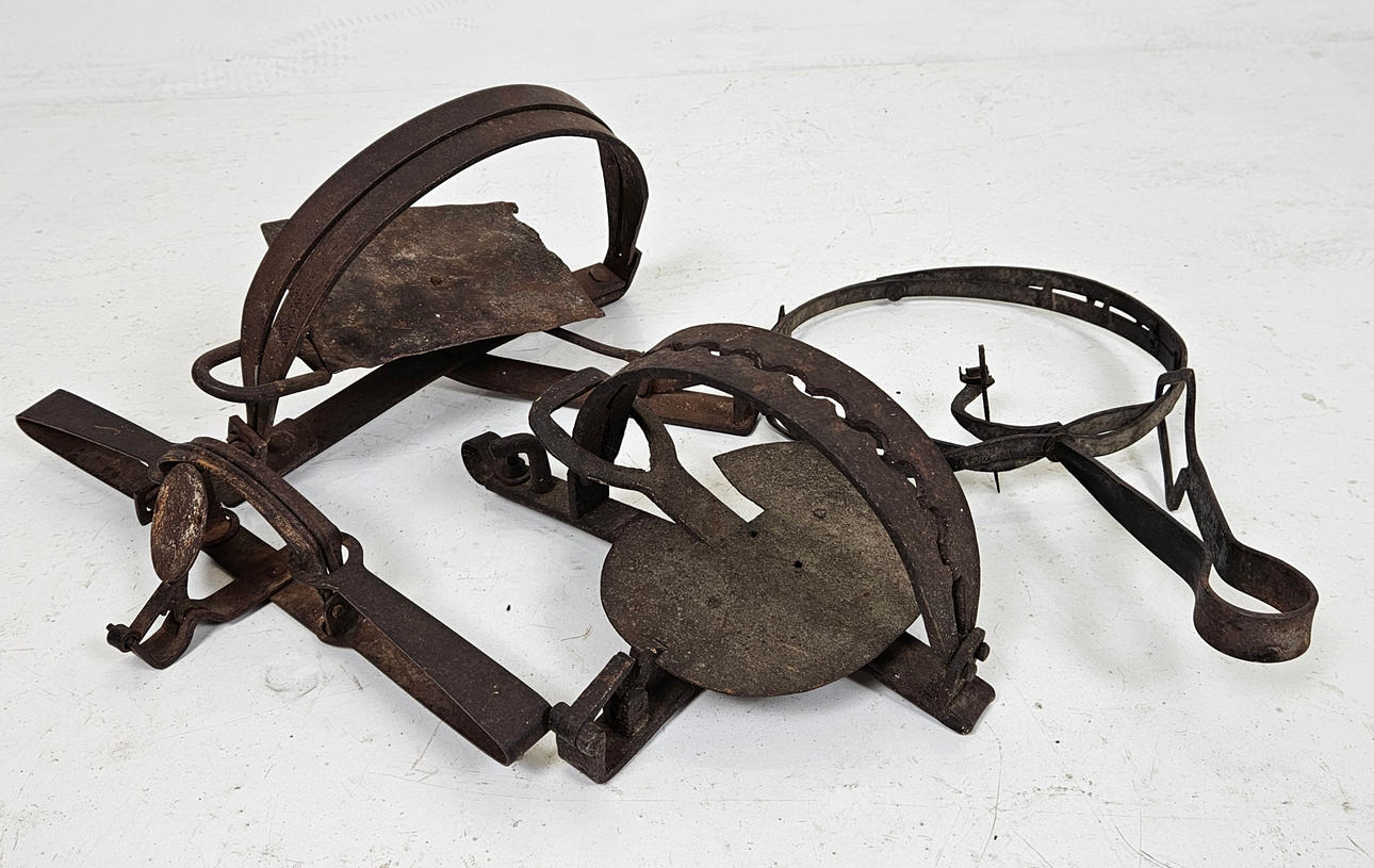 A set of four metal trappers, 1800/20th century. Weapons & Militaria ...