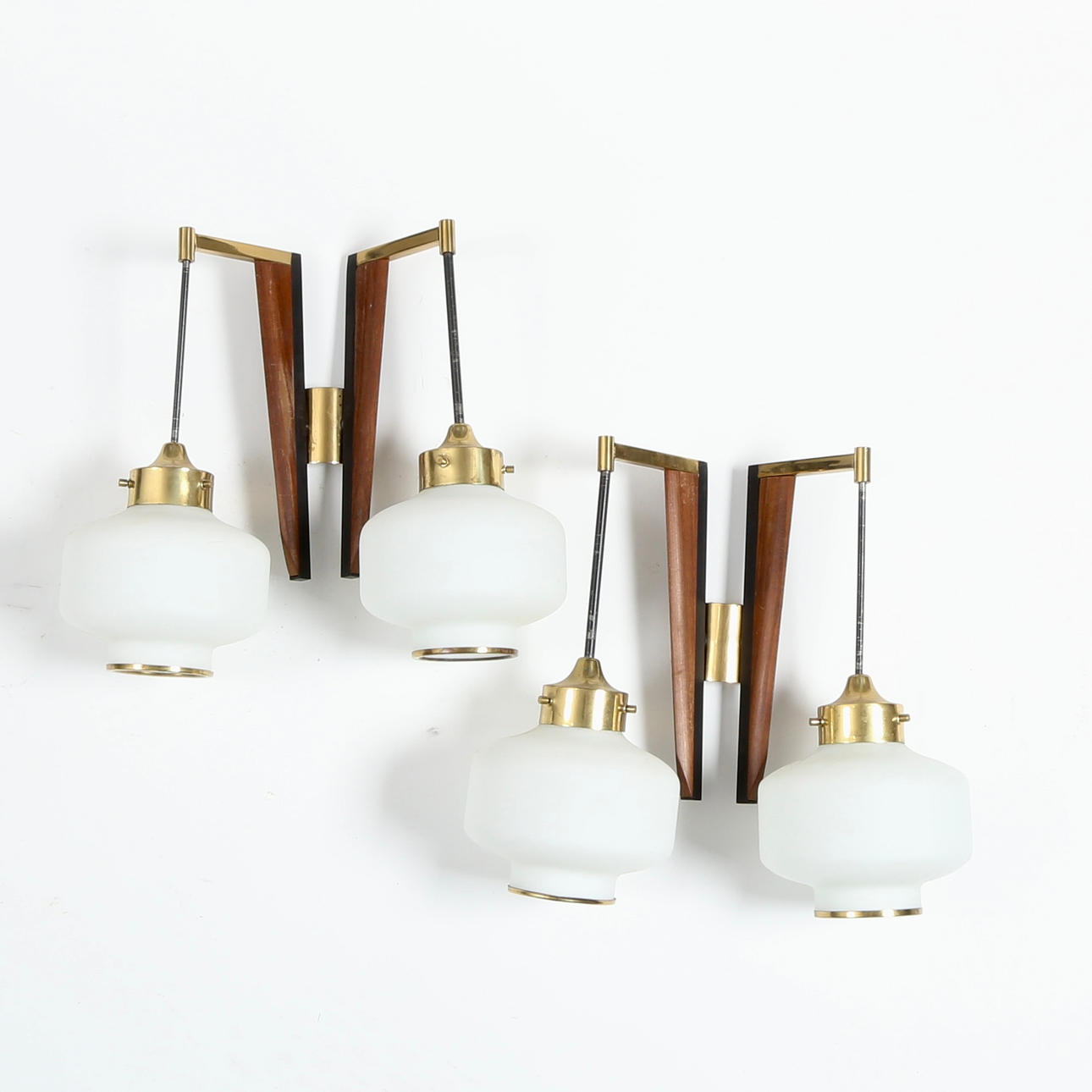 SKANDINAVISK DESIGN. A pair of brass, teak and white opal glass double ...