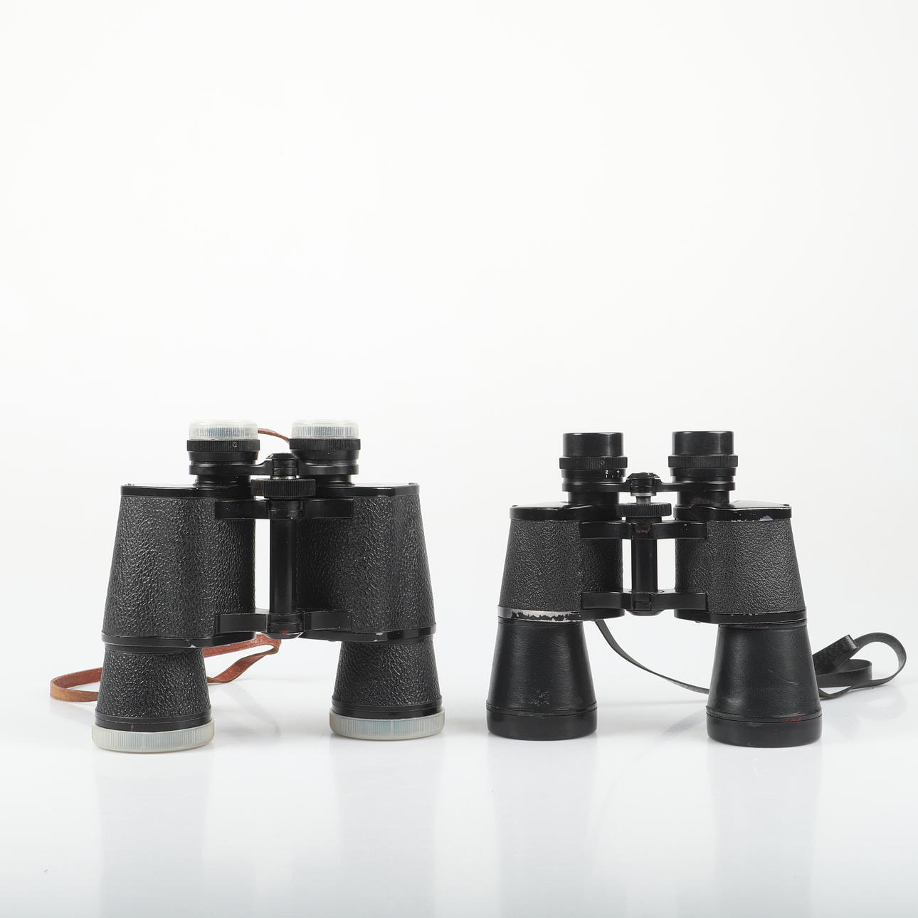 BINOCULARS, 2 pieces with bags.