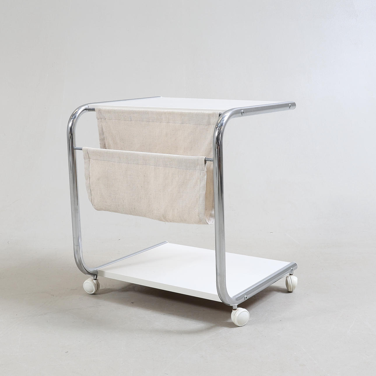 THOMAS JELINEK. A 1980s Ikea 'Strajk' side table/rolling table.