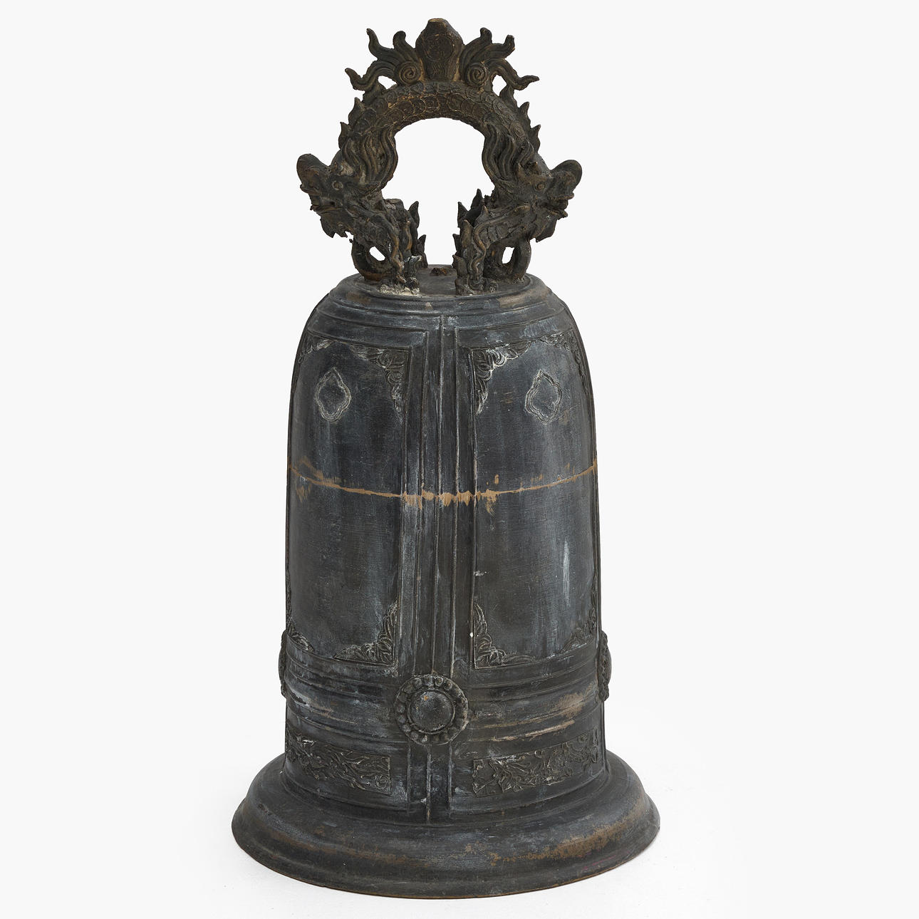 A 20th-century Buddhist monastery clock, Vietnam, patinated metal ...