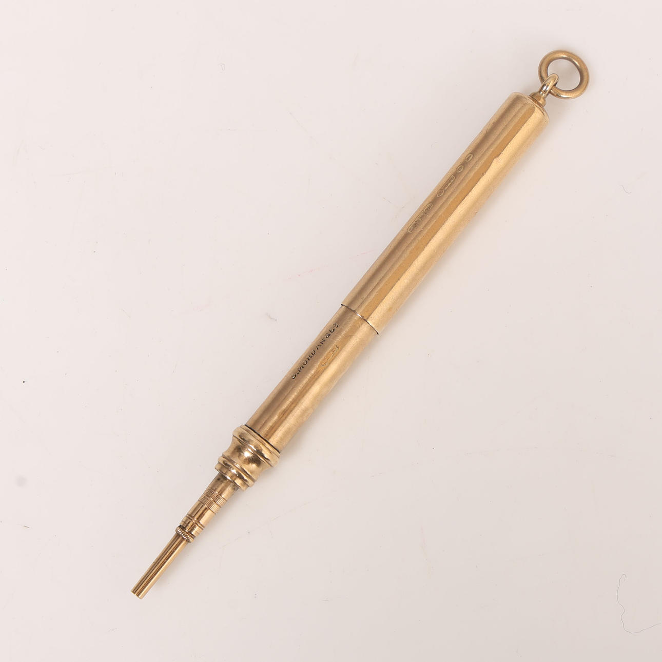 A 9 CARAT GOLD PROPELLING PENCIL BY SAMPSON MORDAN & CO