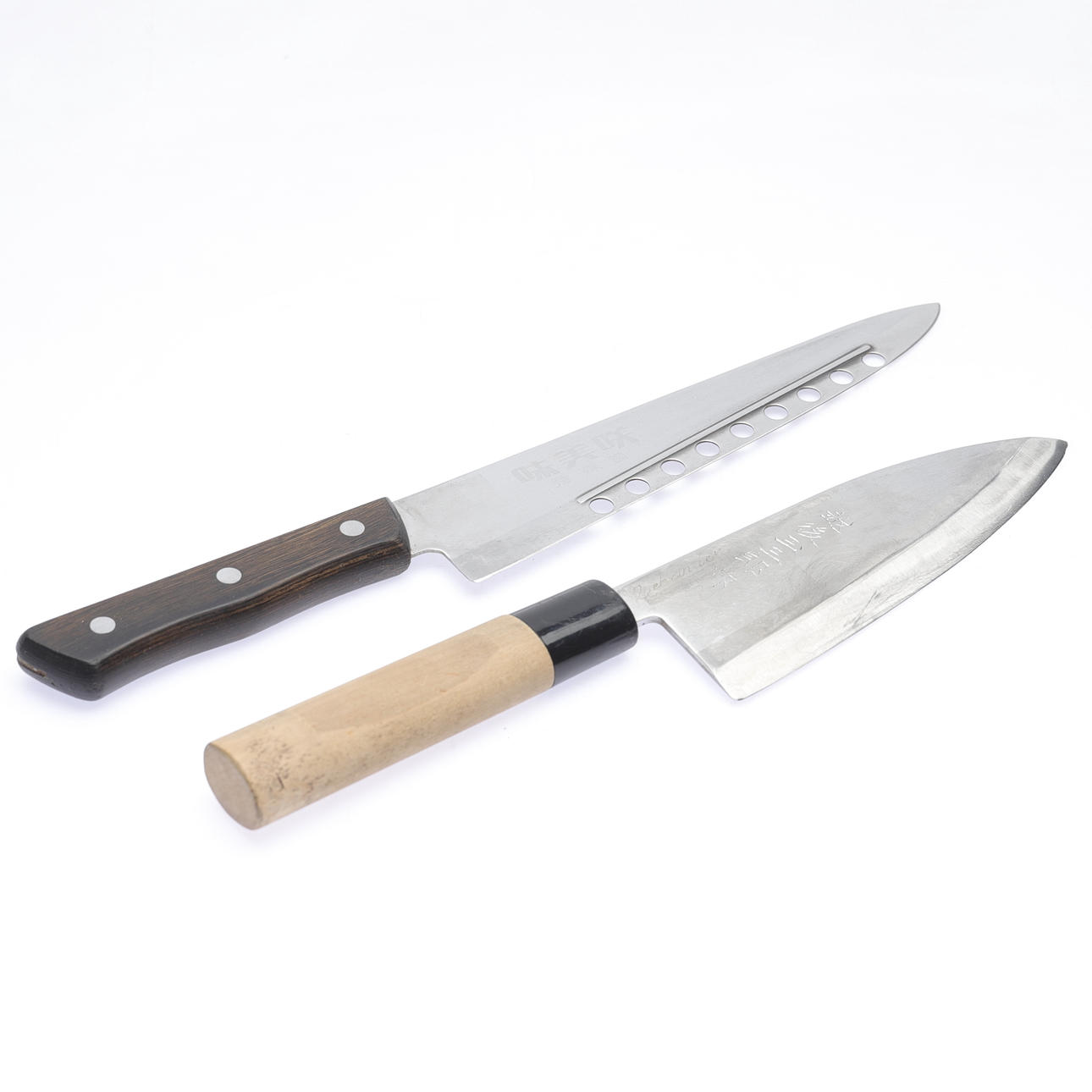 A set of 2 Japanese-style kitchen knives, 21st century. Weapons ...
