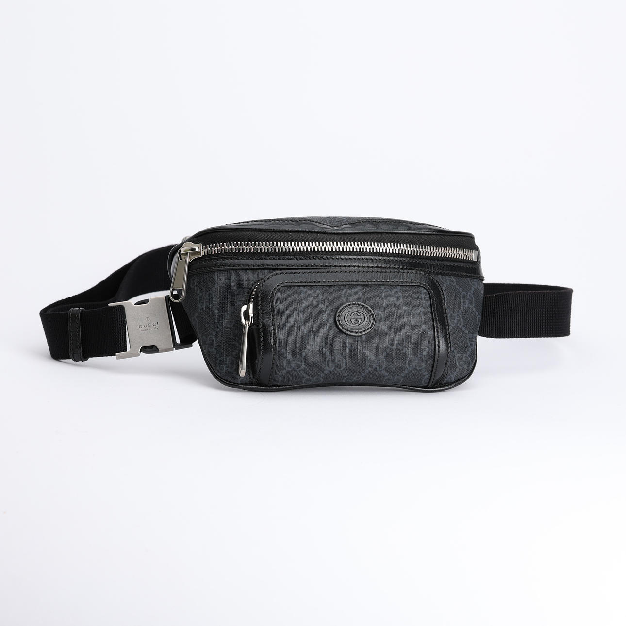 GUCCI, belly bag, monogrammed embossed canvas.