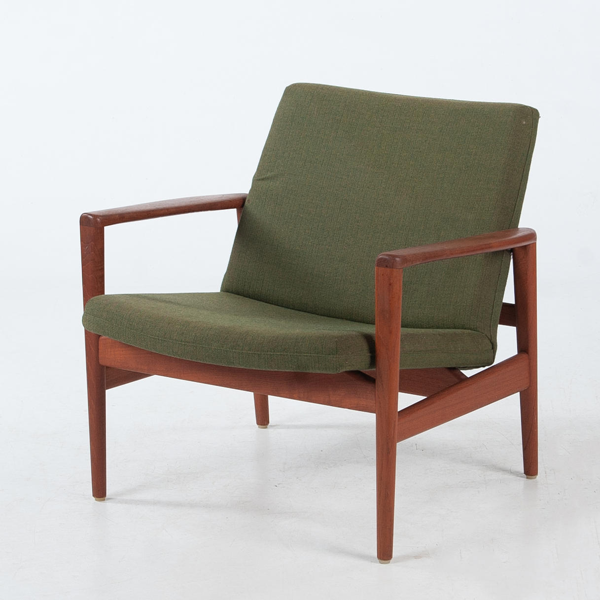 Un sillón, teca, años 60.