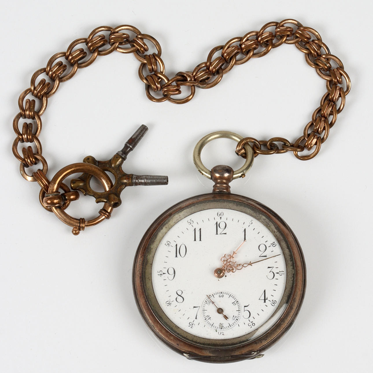 A pocket watch, silver, sk. 19th century key puller.