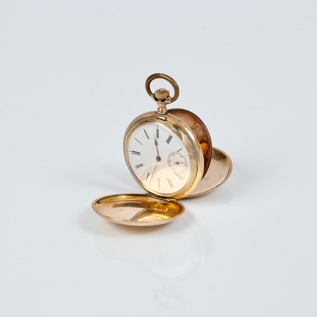 Dobbeltkapslet lommeur af 14K guld.