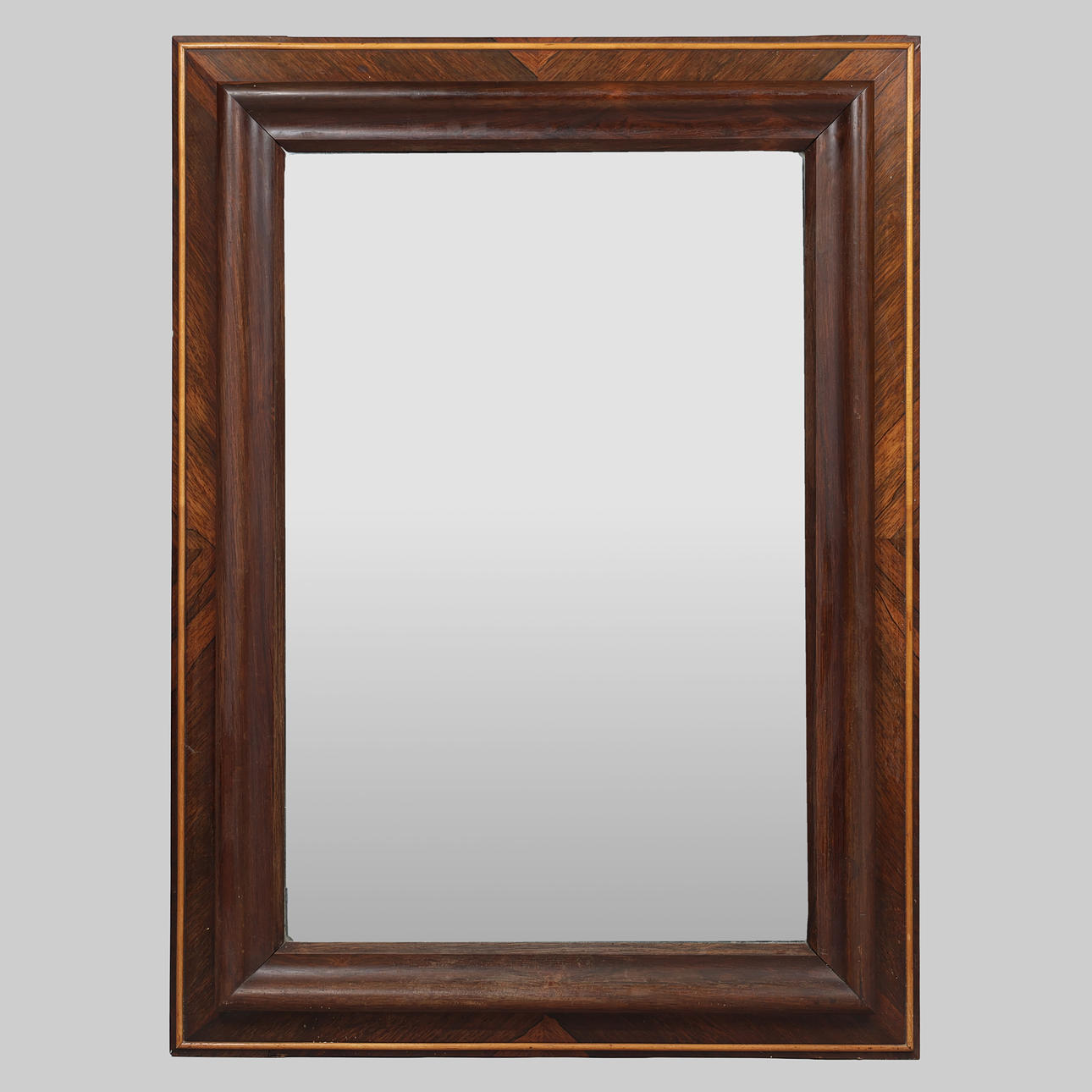 Wall mirror with profiled frame, circa 1900.