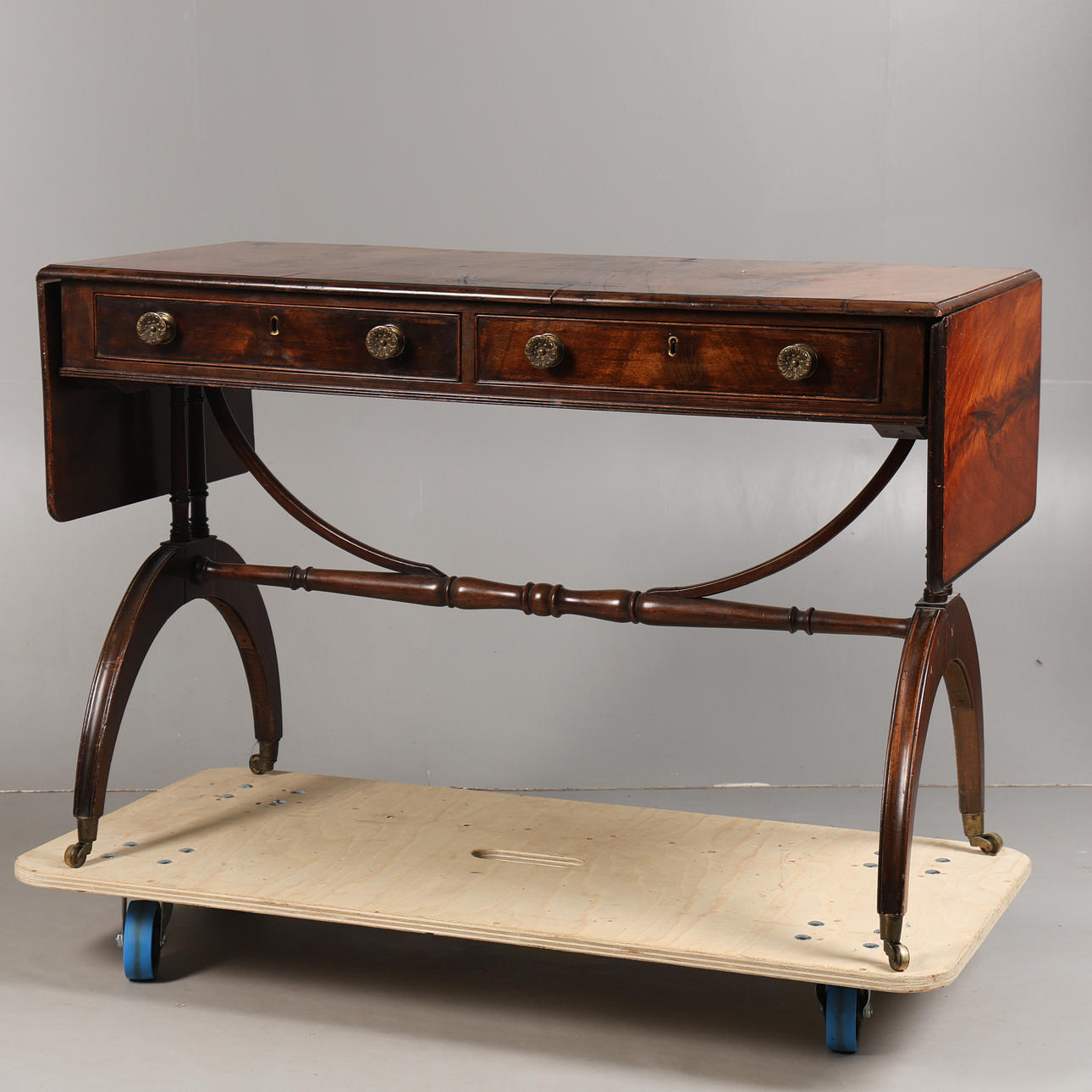 A REGENCY MAHOGANY SOFA TABLE.