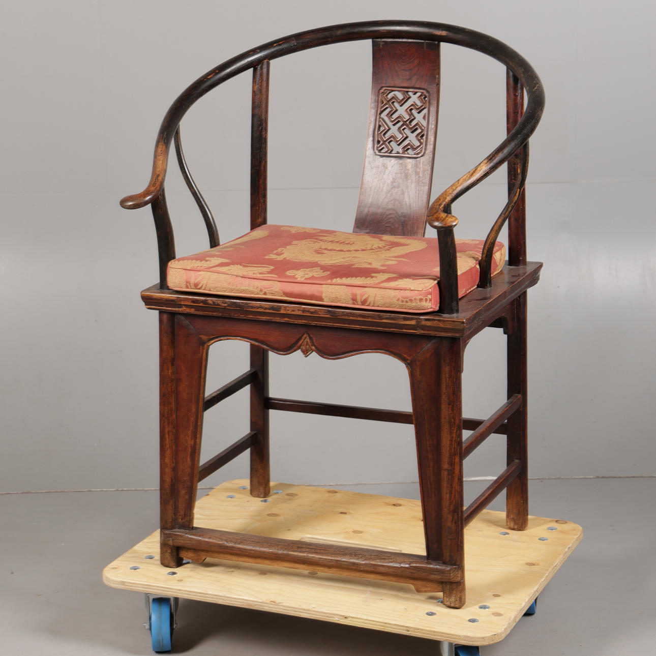 A CHINESE ELM ARMCHAIR.